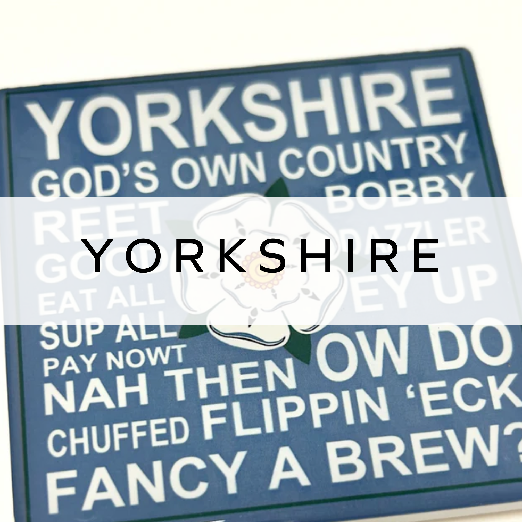 A blue and white coaster featuring Yorkshire slang sayings, with fun and playful typography, perfect for adding a touch of local charm to your table.
