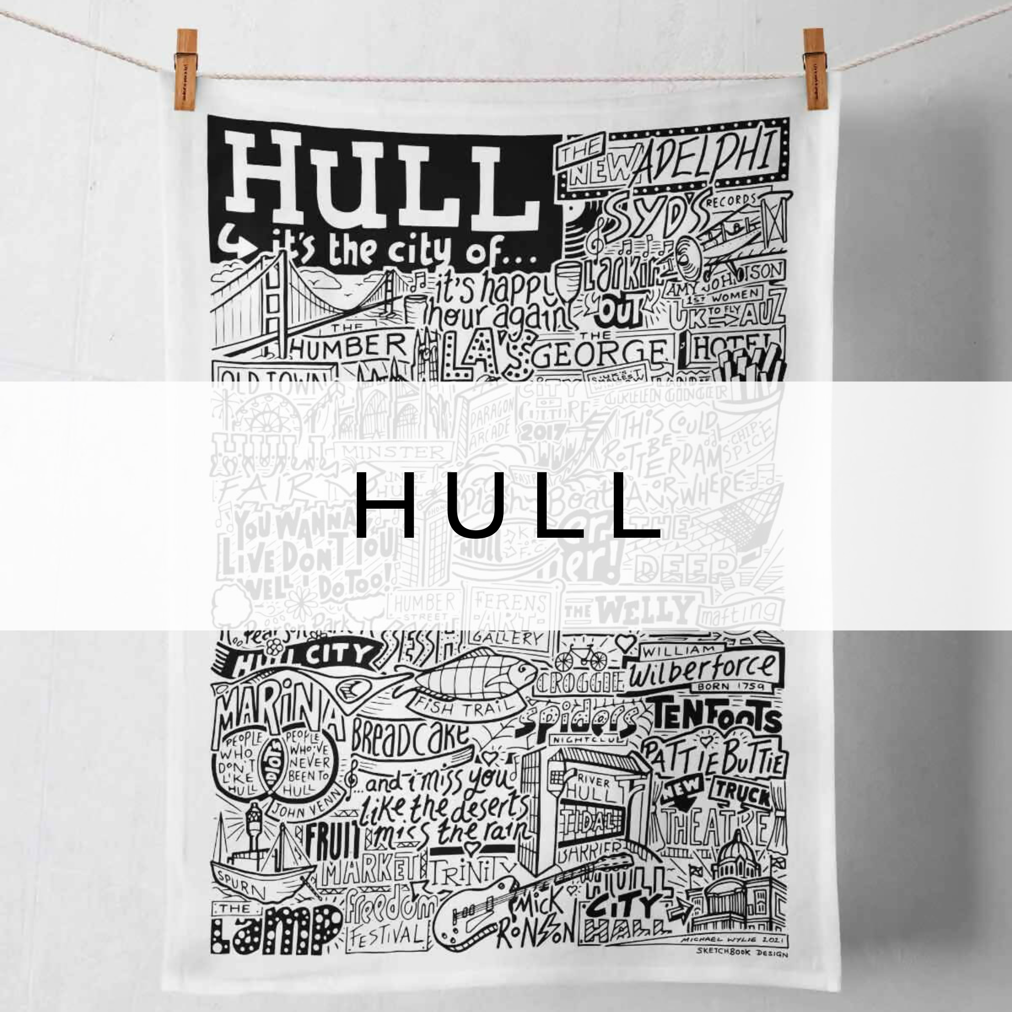Black and white tea towel featuring an illustration of Hull's landmarks.