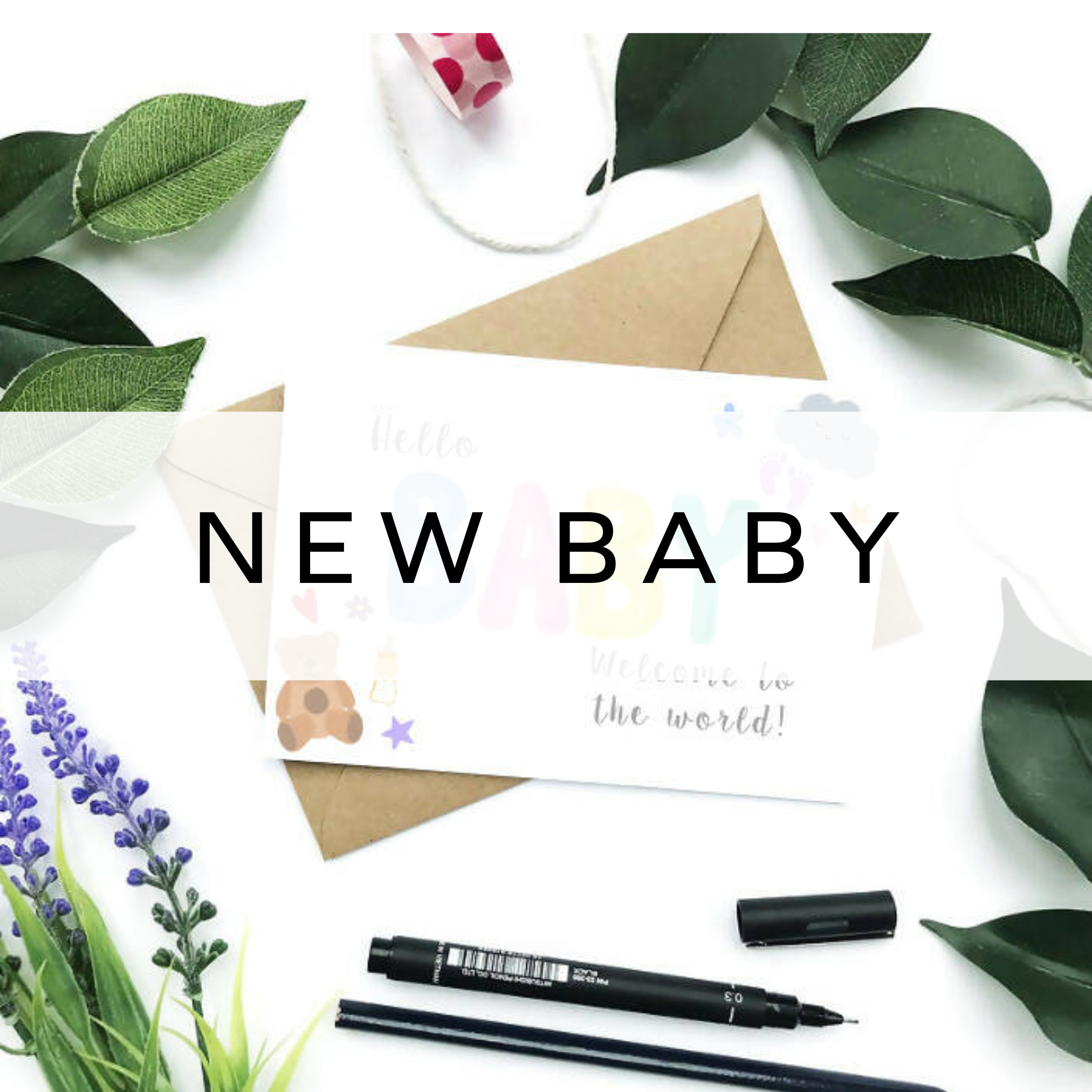 New baby card featuring a cute design surrounded by green leaves