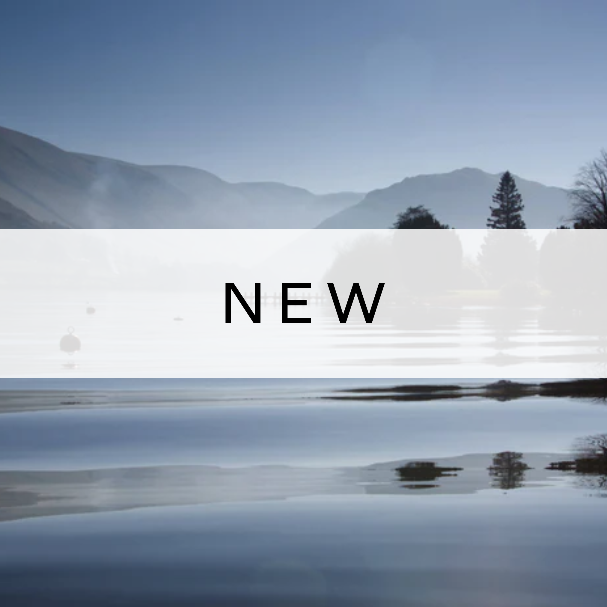 Serene misty blue lake, captured in soft, calming tones with gentle mist hovering over the water, evoking a tranquil, peaceful atmosphere.