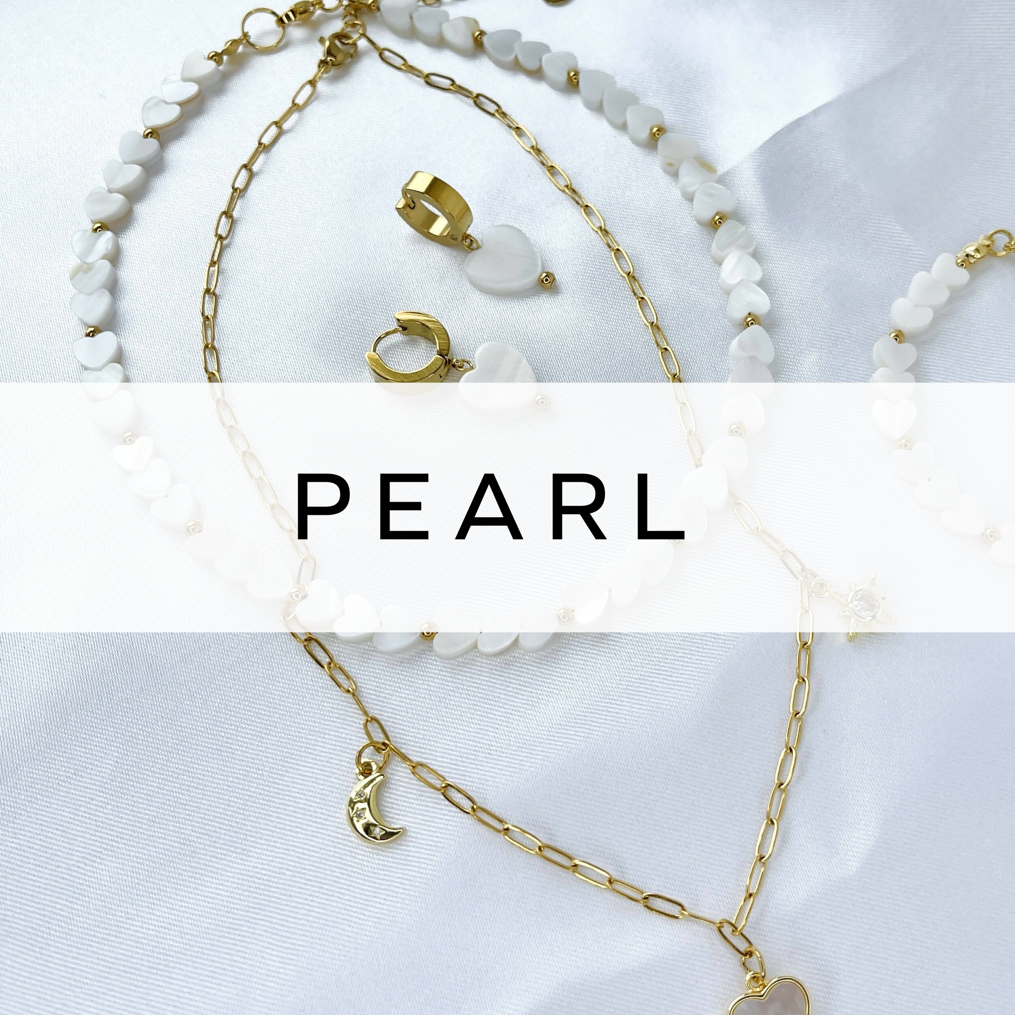Elegant heart-shaped pearl jewellery set featuring a necklace and earrings, combining timeless beauty with a romantic, sophisticated design.