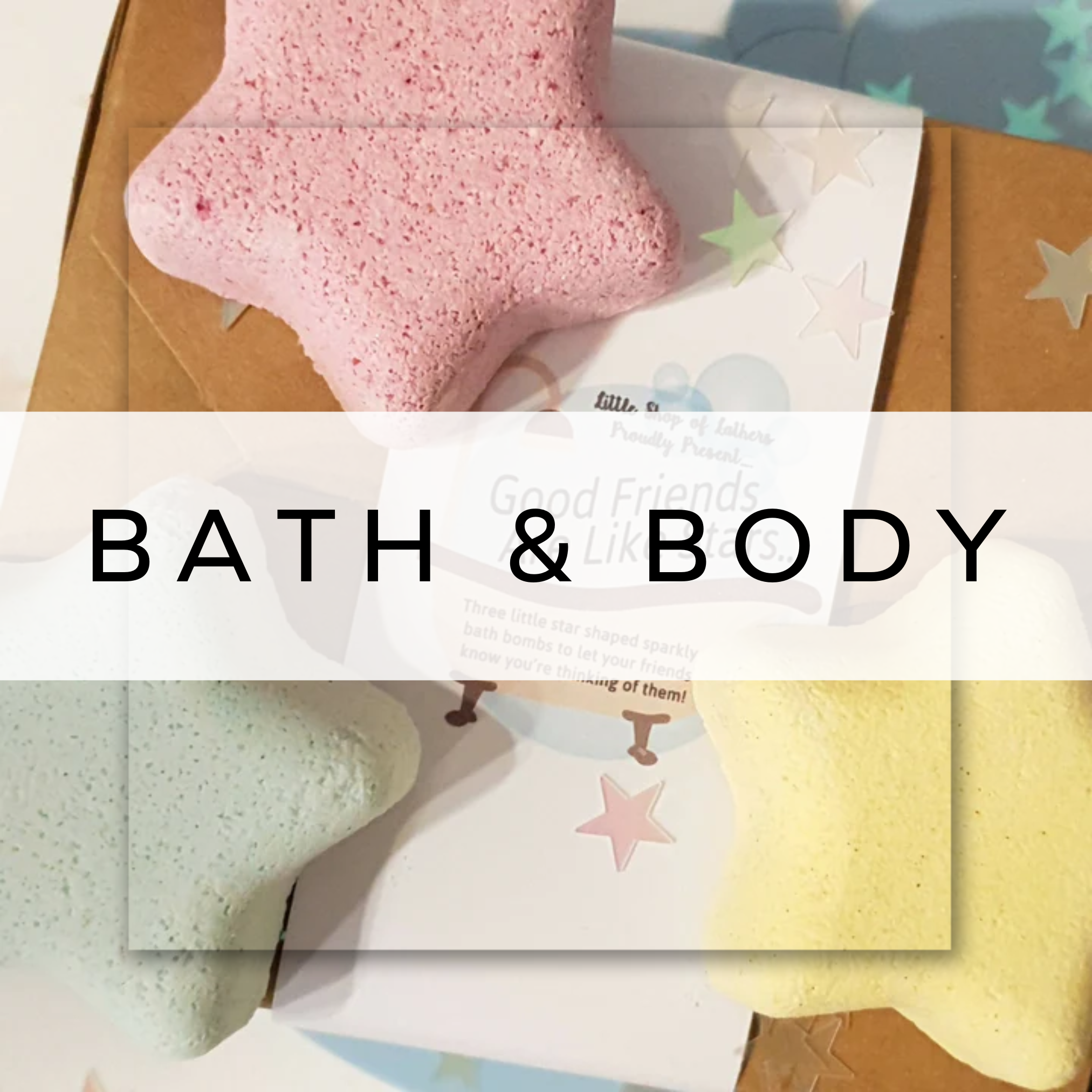 Bath set box with colourful star-shaped bath bombs arranged on top"**