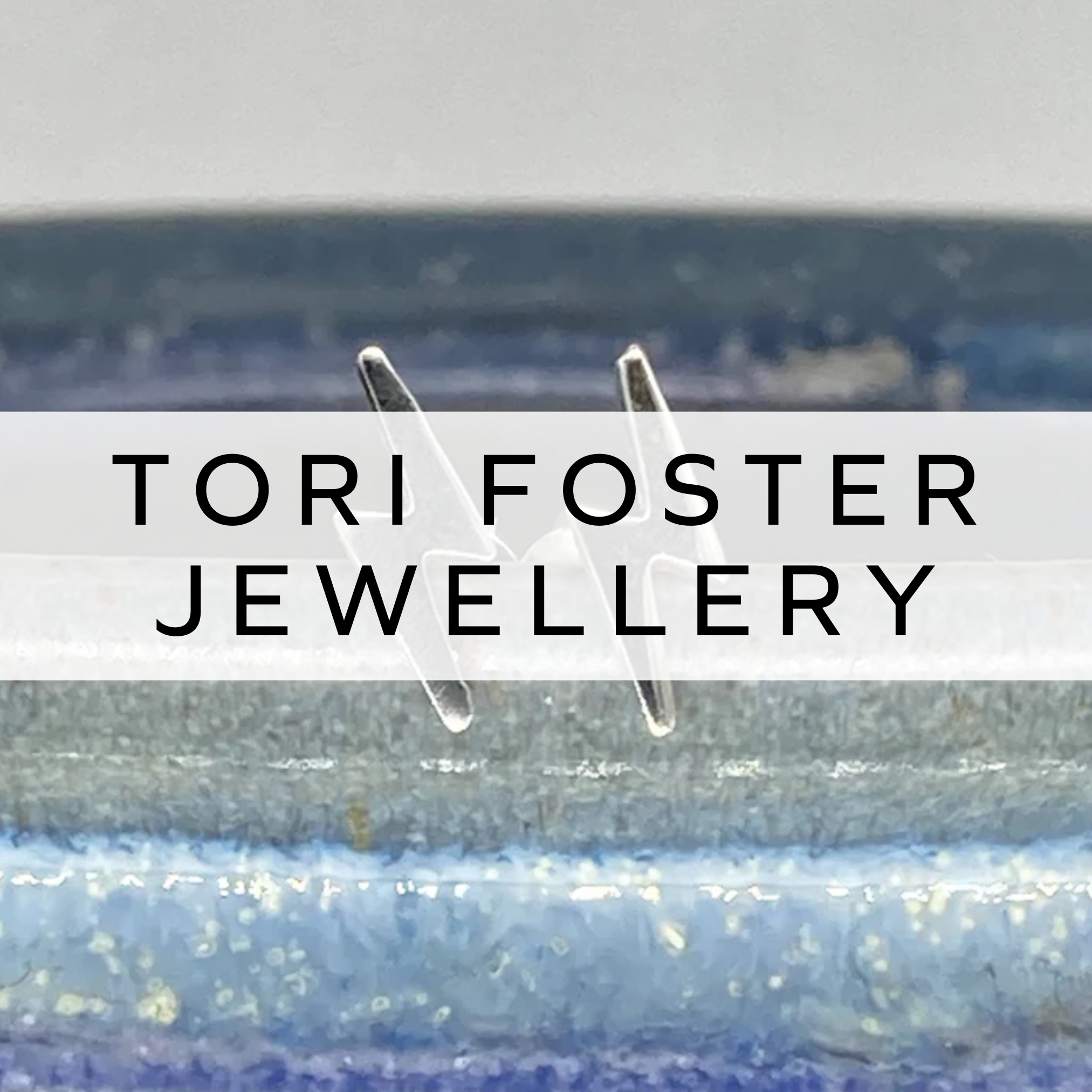 Sterling silver stud earrings in the shape of a lightning bolt, offering a bold and striking design.