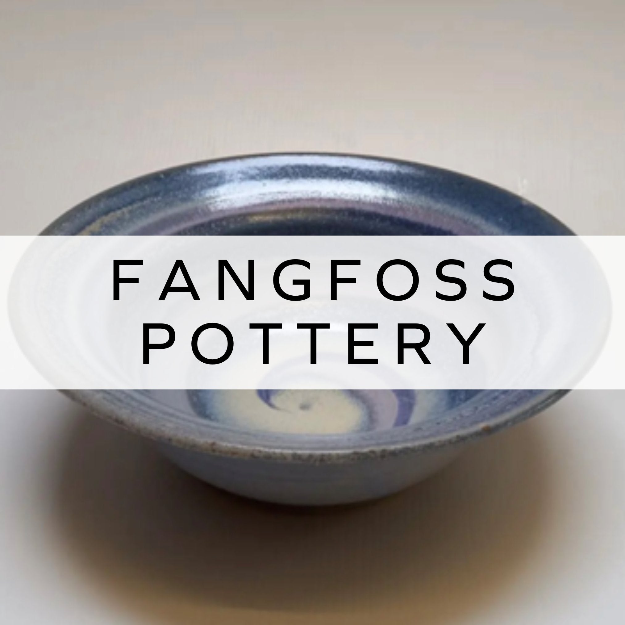 Handcrafted stoneware bowl with a wide rim, featuring a stunning blue swirl glaze, showcasing unique craftsmanship and a beautifully textured finish.