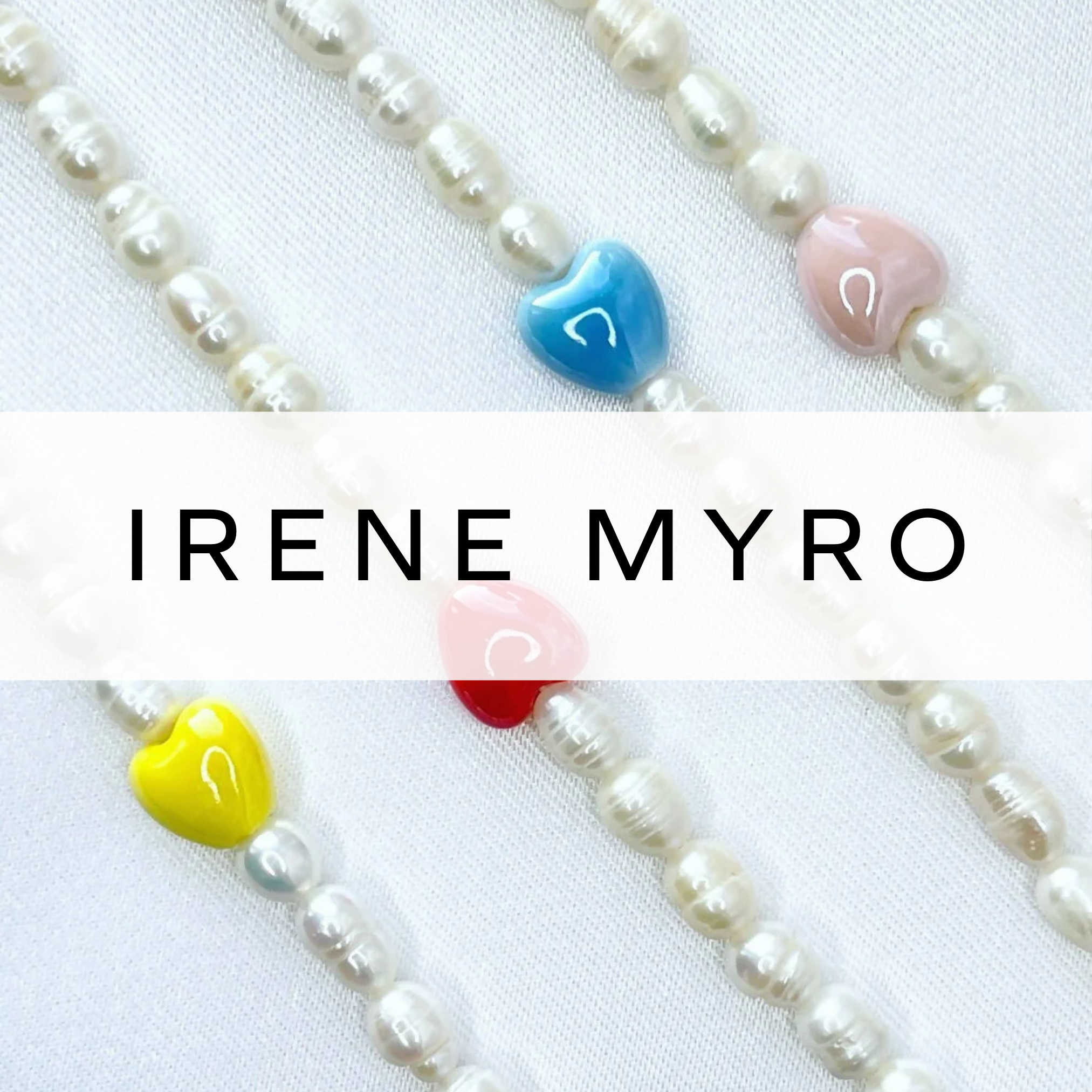 Elegant pearl bracelets featuring a brightly coloured heart bead at the centre, combining classic charm with a playful, modern touch.