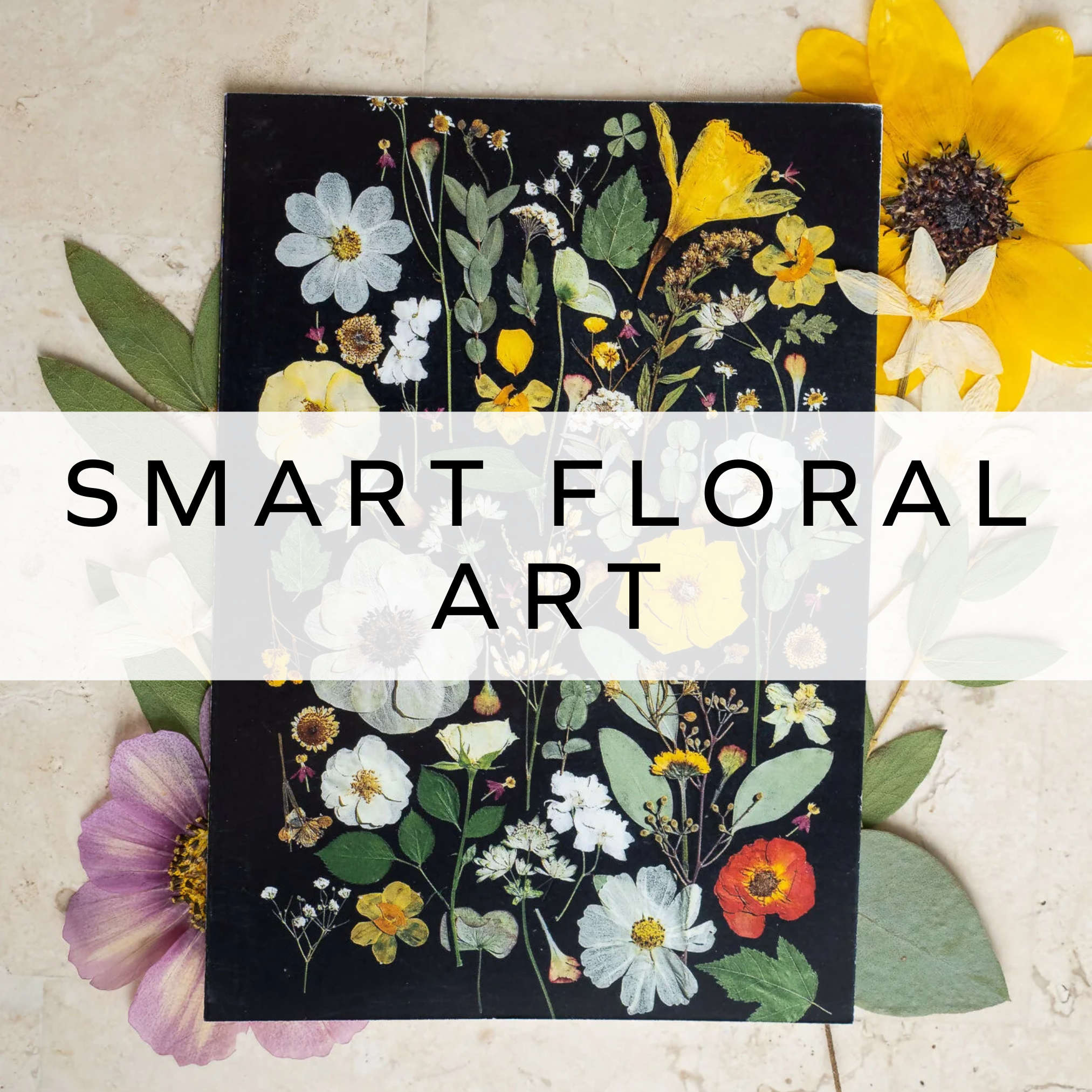Black notebook featuring brightly coloured pressed flowers on the cover, creating a vibrant and natural design that beautifully combines nature with stationery.