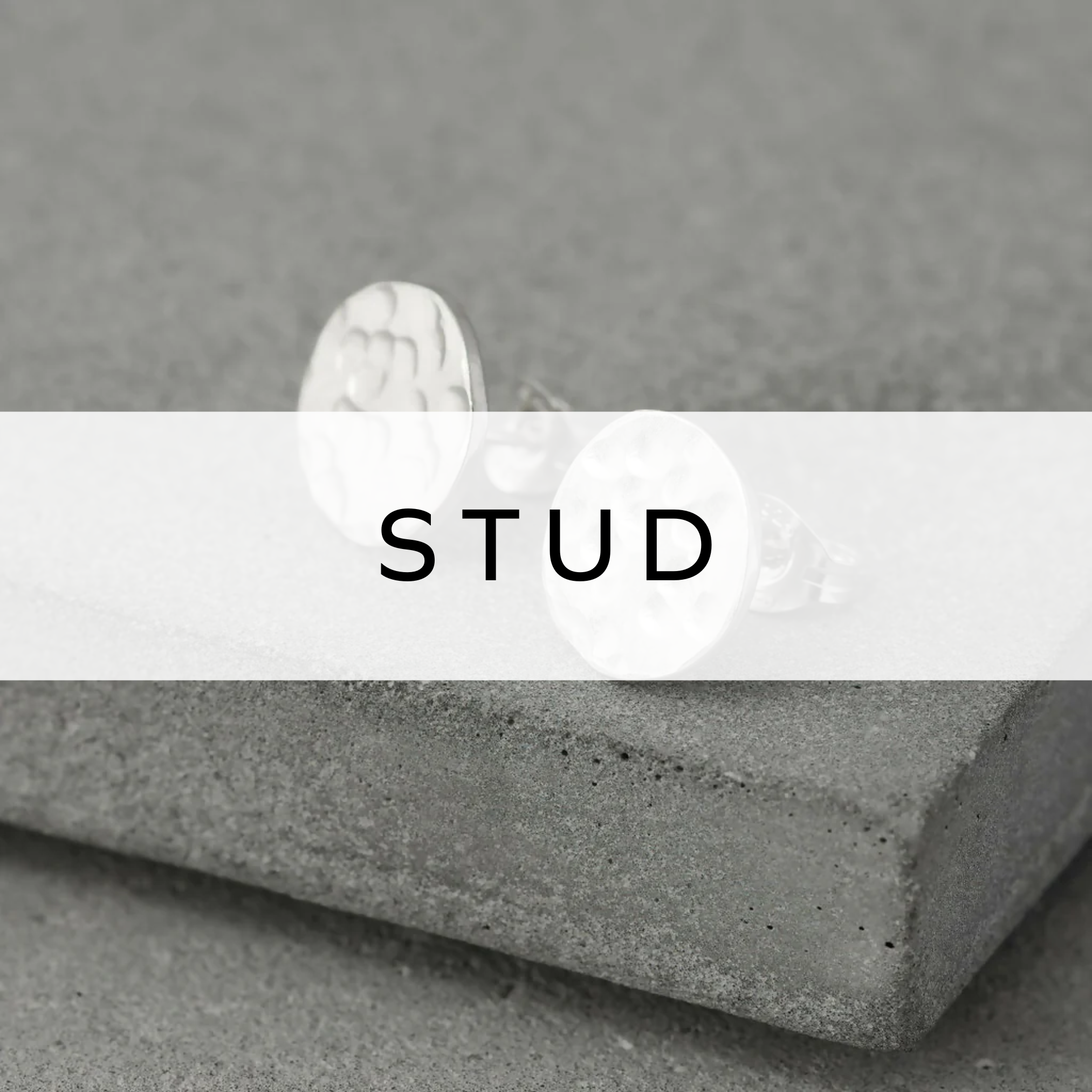 Minimalist silver stud earrings with a sleek, polished finish—perfect for everyday wea