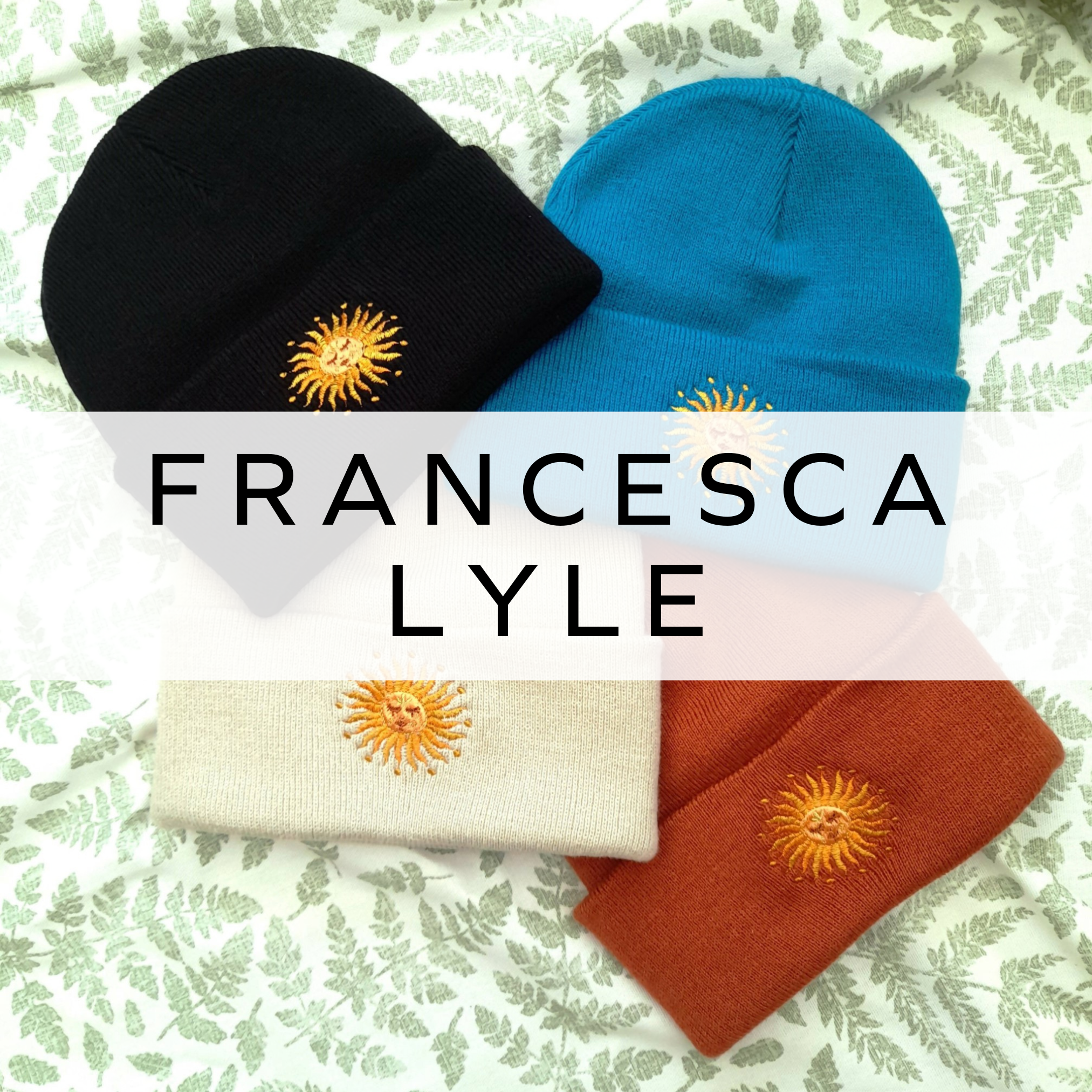 Four colourful beanies, each featuring the same embroidered sun logo on the front centre, showcasing unique digital embroidery and stylish handmade design.
