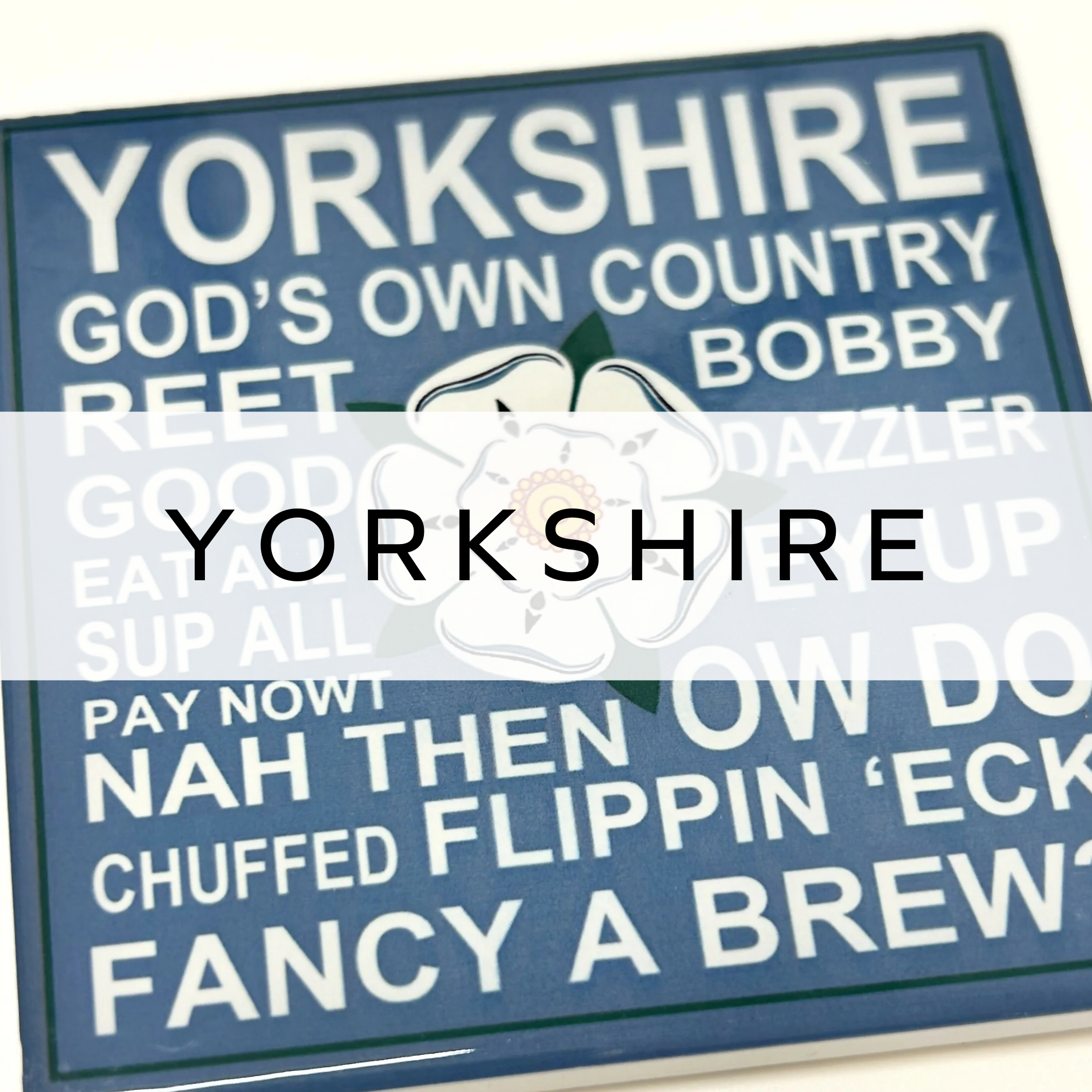 Blue and white coaster featuring fun Yorkshire slang design, perfect for adding a touch of Yorkshire charm to your home or as a unique gift.