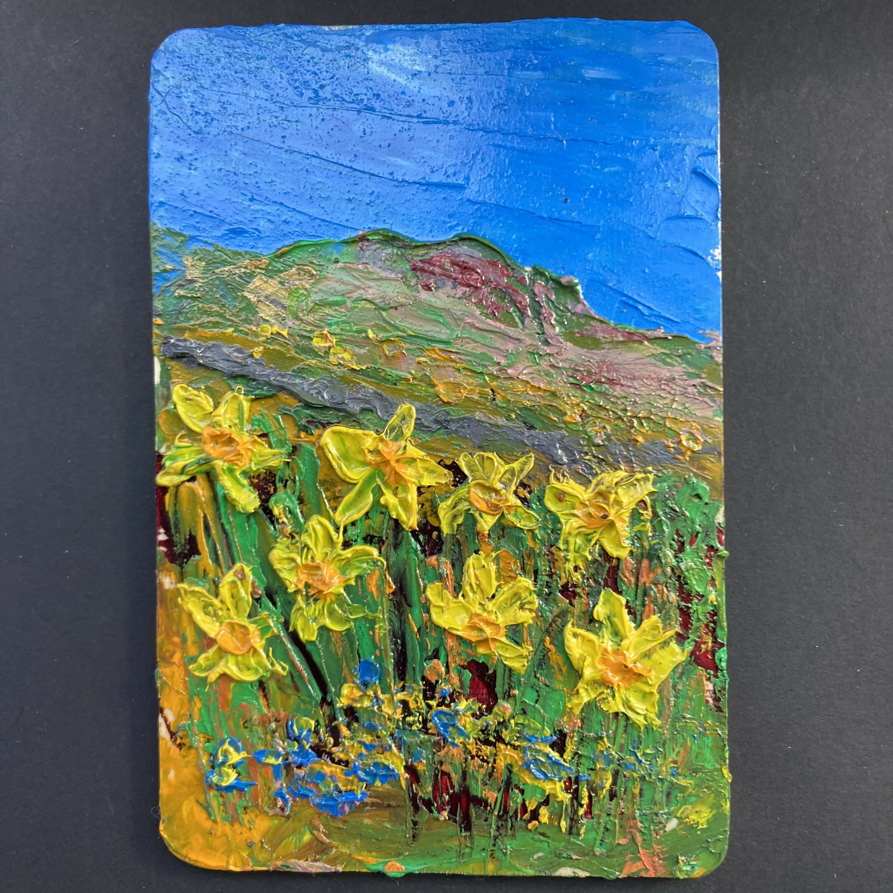 Daffodils & Forget Me Nots - Black Framed Oil Painting On Wood