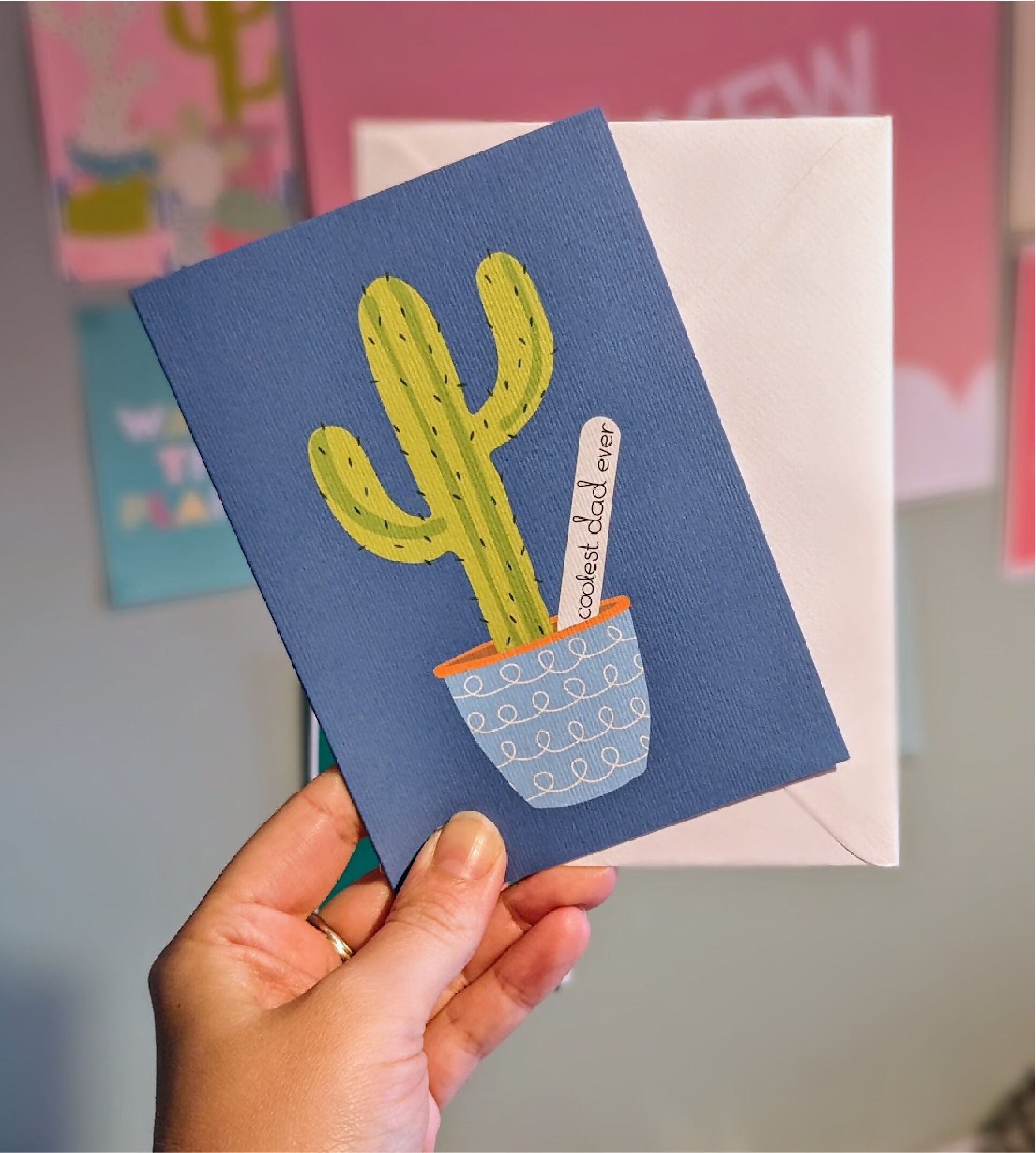 Blue card with cactus on.