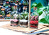 Three colourful terrariums displayed on wood.