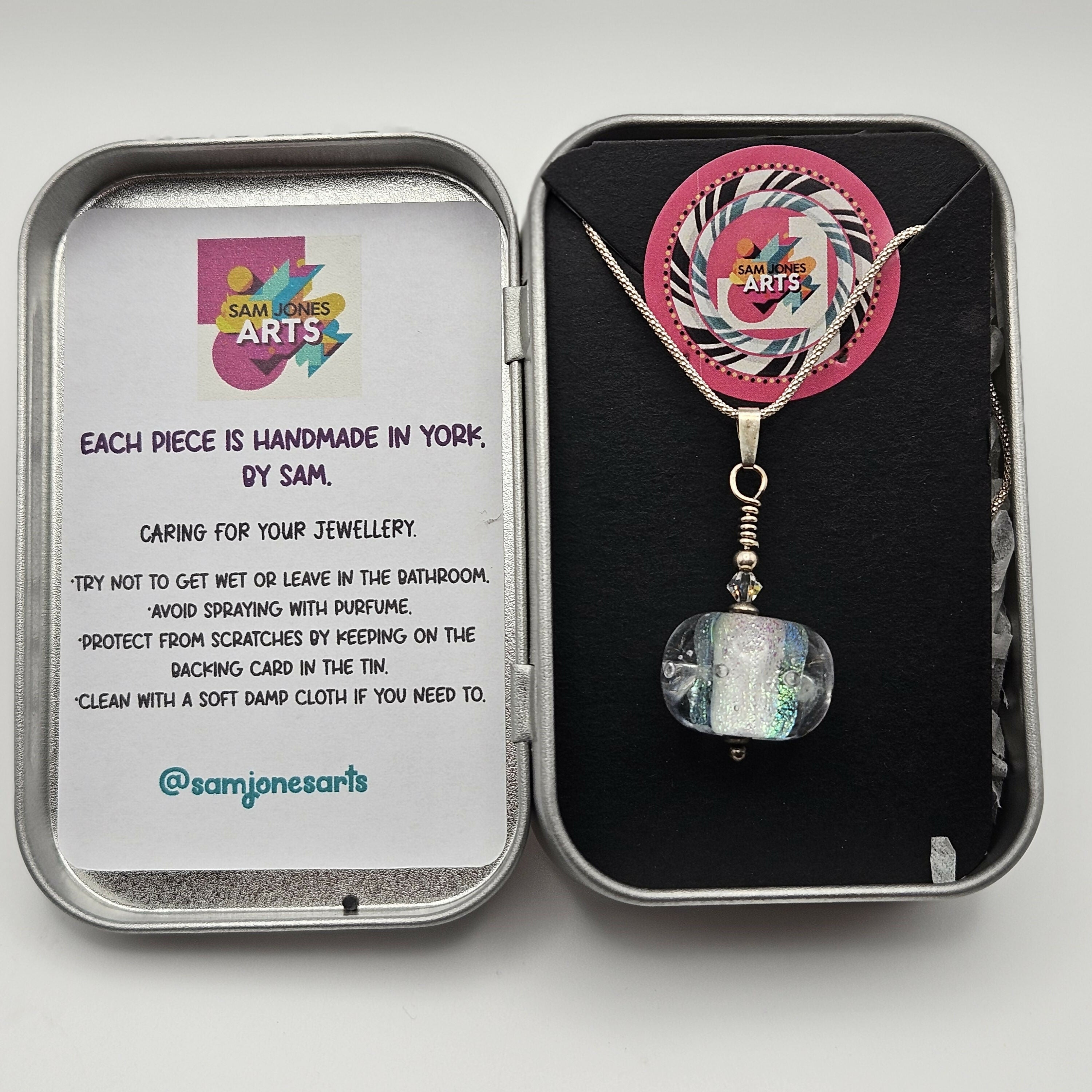 HANDMADE GLASS LAMPWORKED ICY DICHRIOC PENDANT,ON A STERLING SILVER CHAIN WITH SWAROVSKI CRYSTALS.