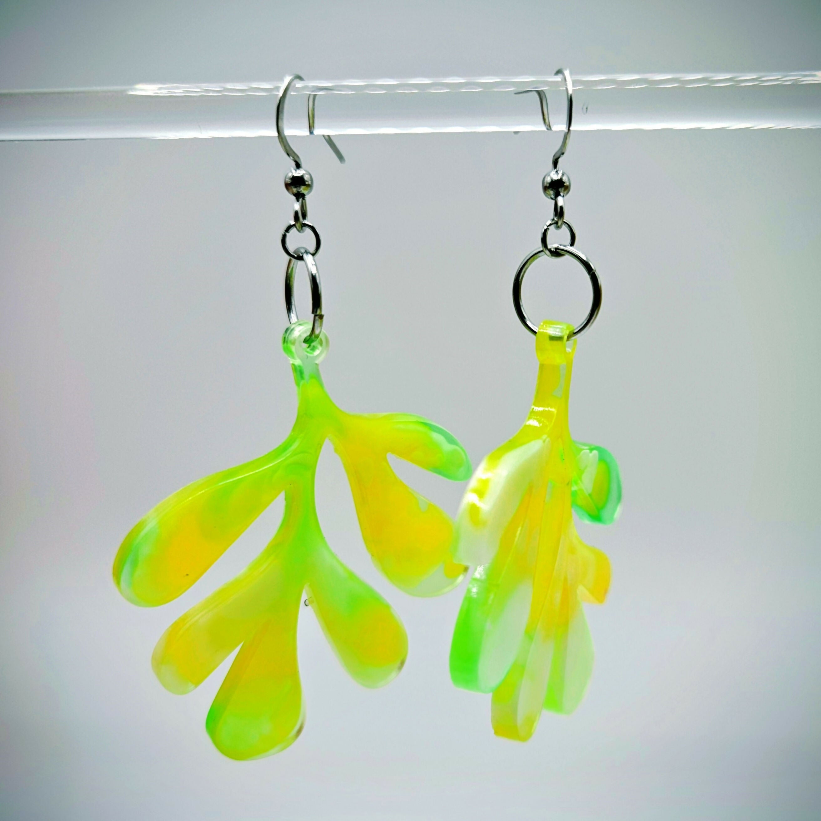 HANDMADE RESIN EARRINGS IN FUN, BOLD LEAF DESIGN.