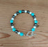 Tibetan Silver Toggle Catch Bracelet with Turquoise, Faceted White Howlite and Faceted Grey Hematite.