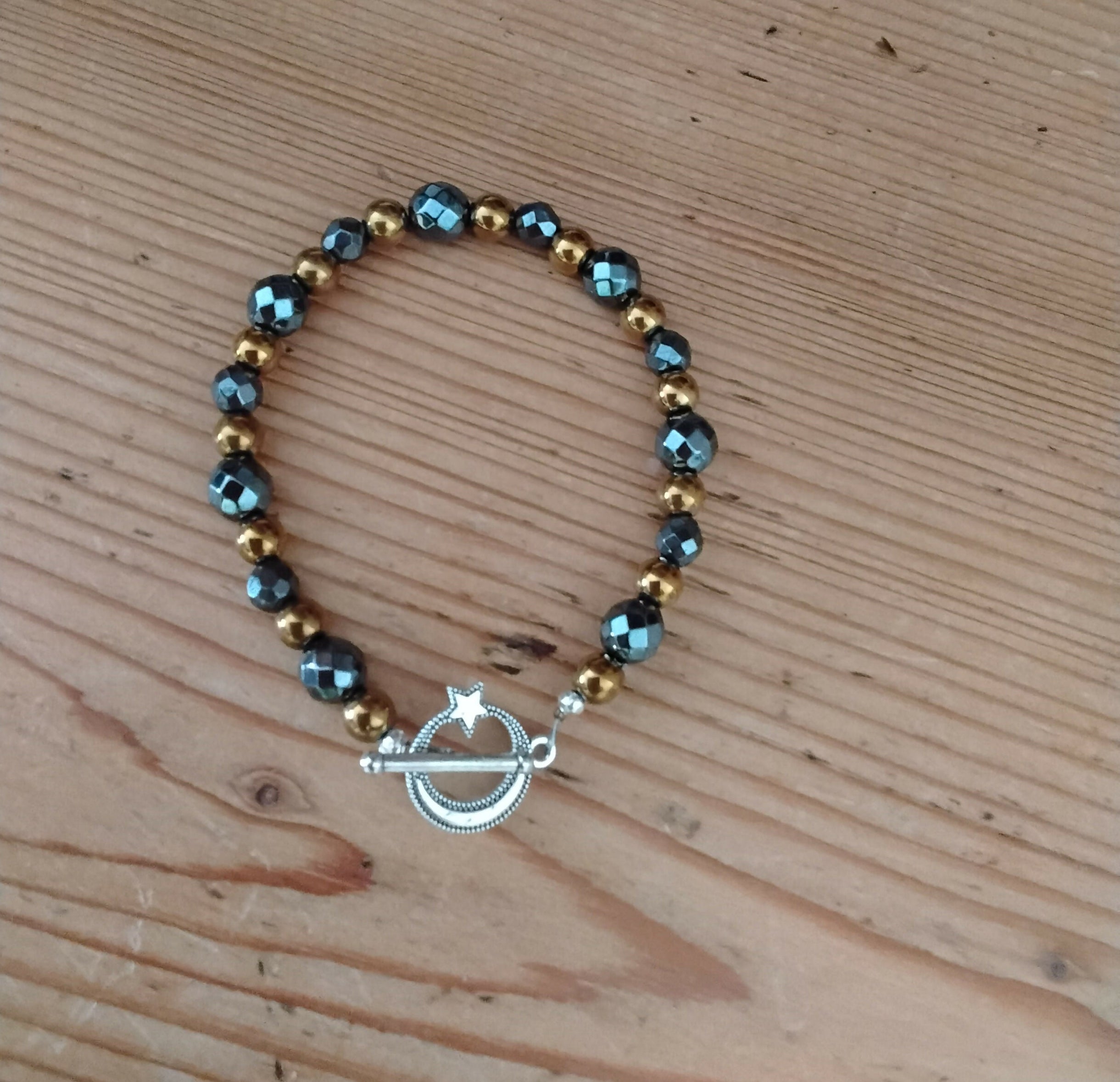 Tibetan Silver Toggle Catch Bracelet with Bronze Hematite and Faceted Grey Hematite.