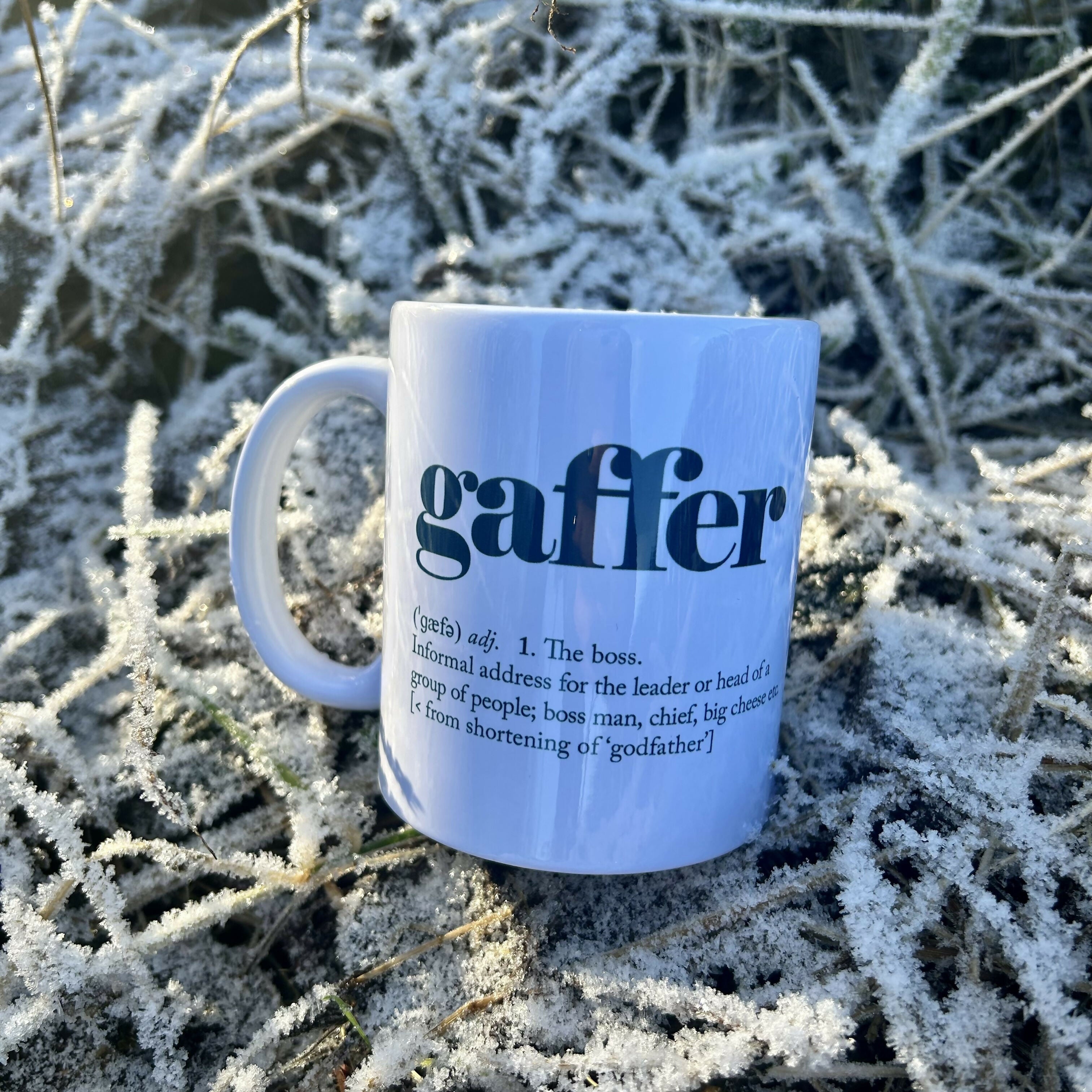 White mug with 'Gaffer' defenition typography on.