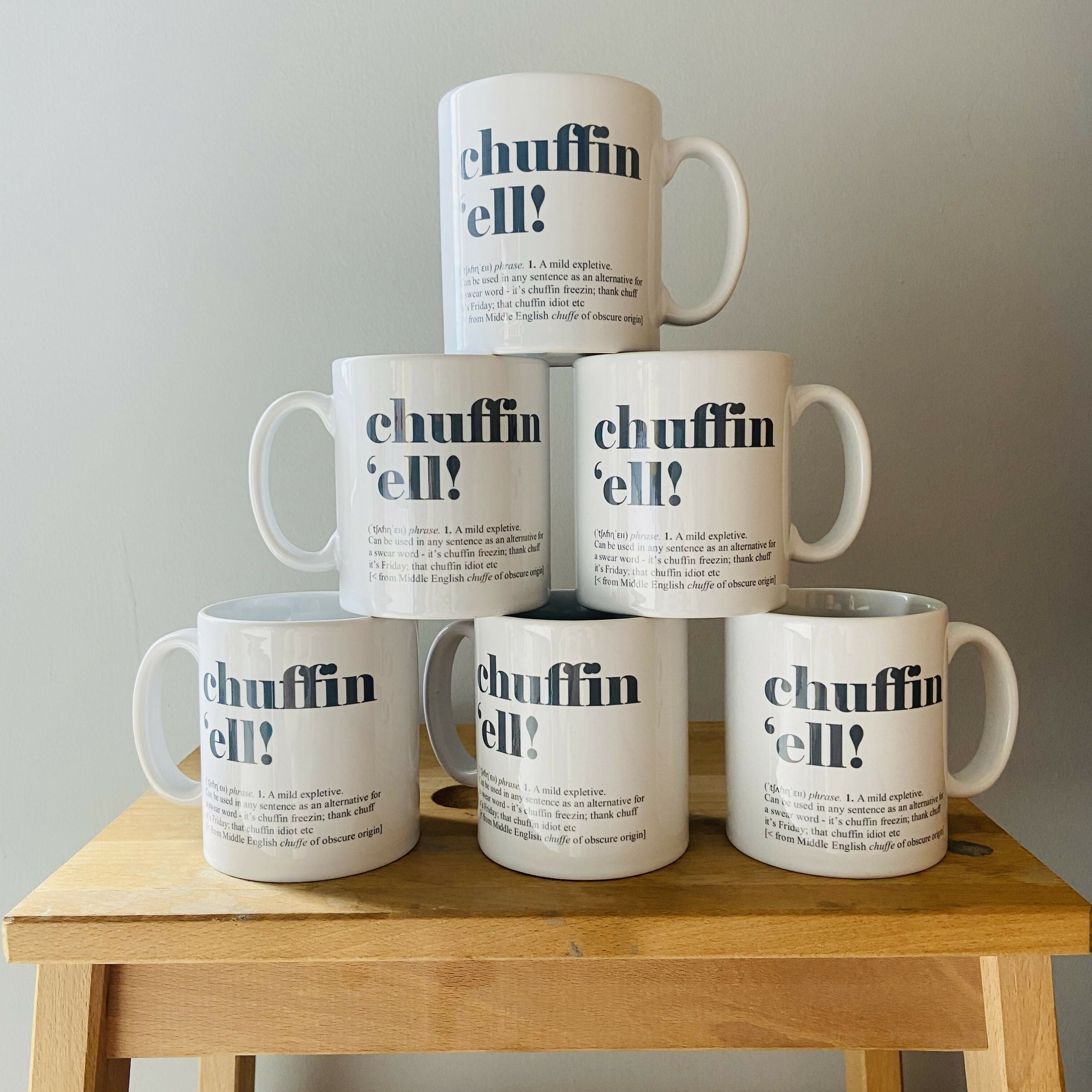 White mug with 'Chuffin 'ell!' definition typography design.
