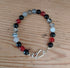 Tibetan Silver Toggle Catch Bracelet with Faceted Black Onyx, Faceted Carnelian and Dragon Vein Fire Agate.