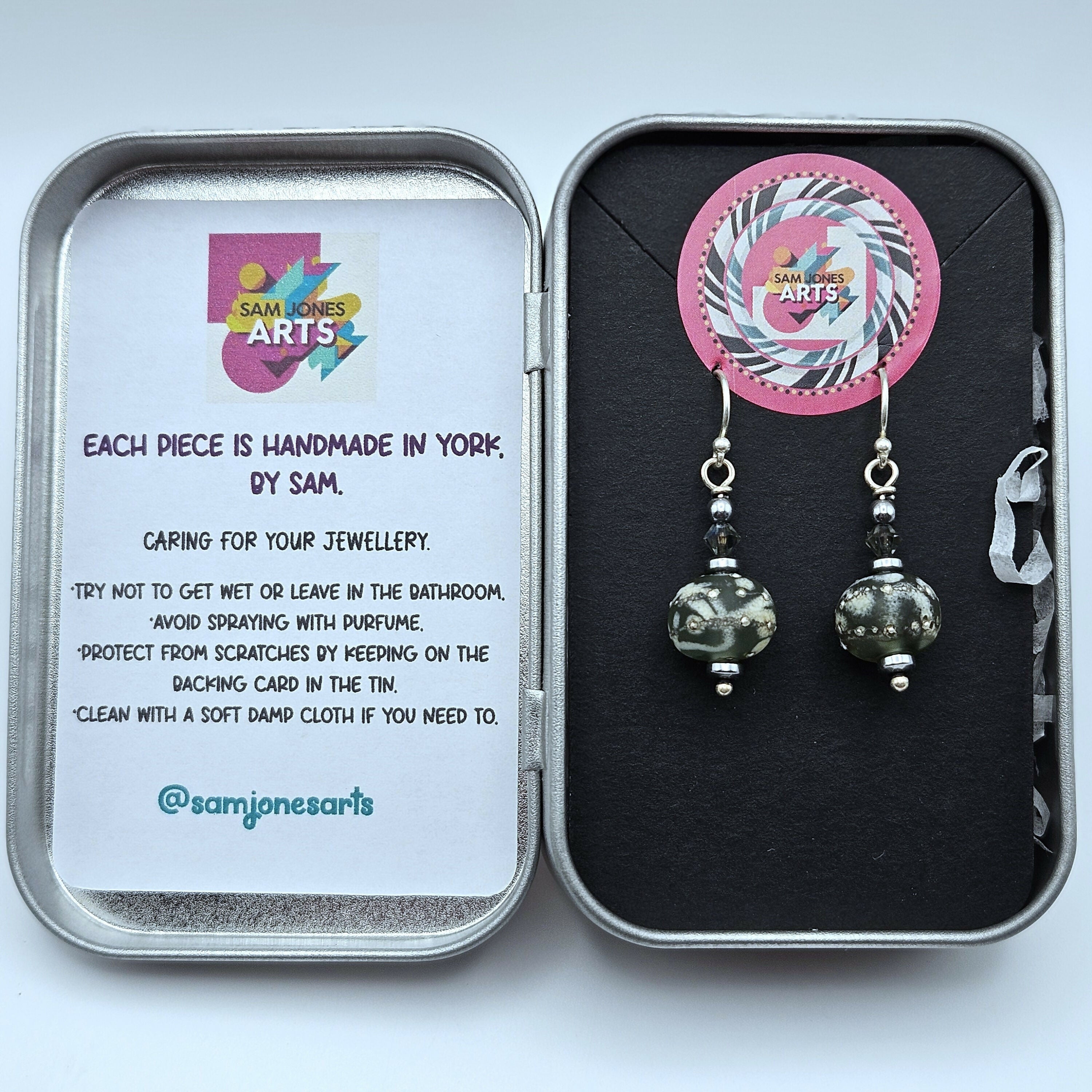 HAND LAMPWORKED GLASS EARRINGS, WITH AN ETCHED FINISH,STERLING SILVER EAR WIRES AND SWAROVSKI CRYSTALS.