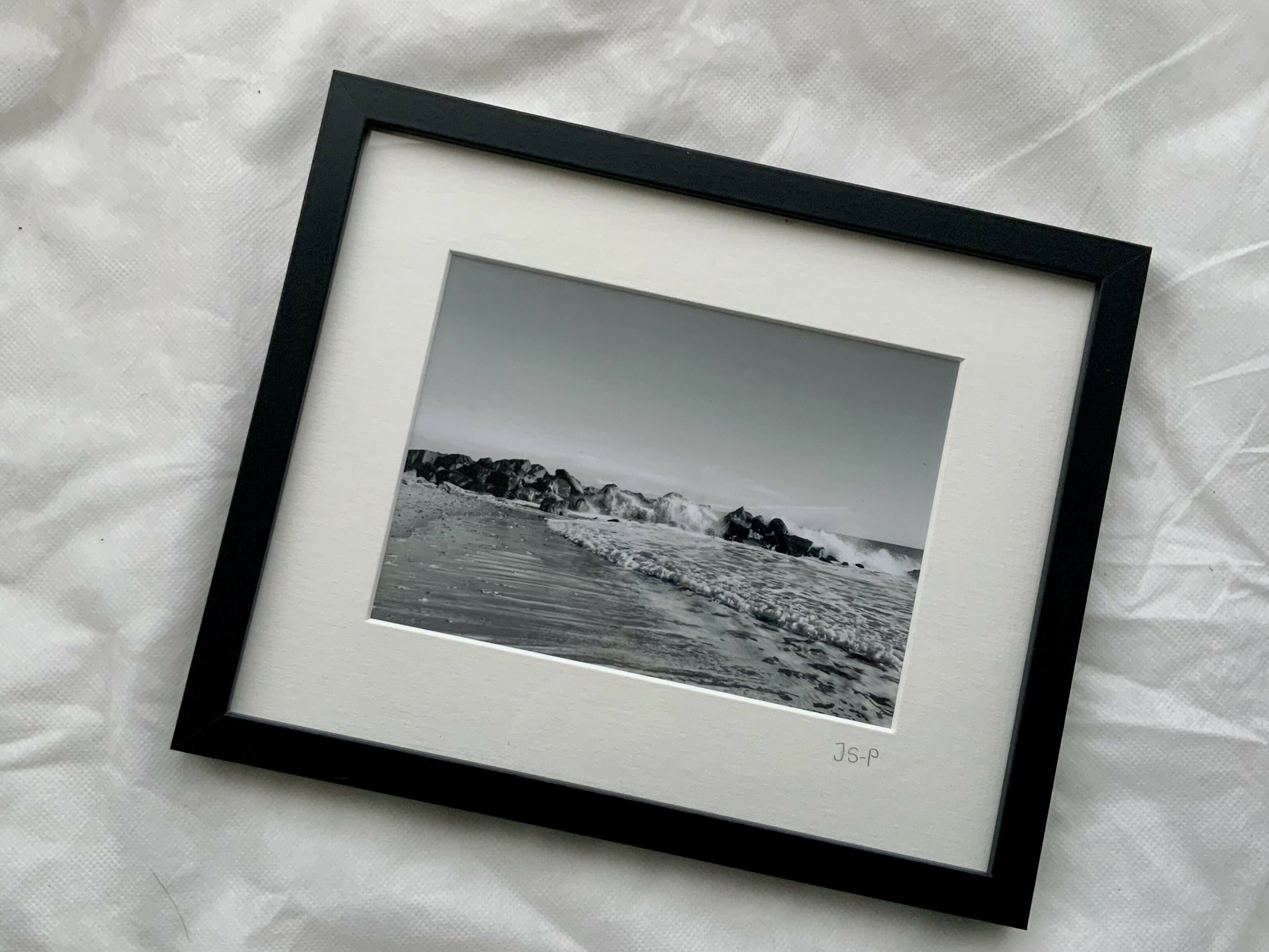Black and white photograph of Mappleton beach.