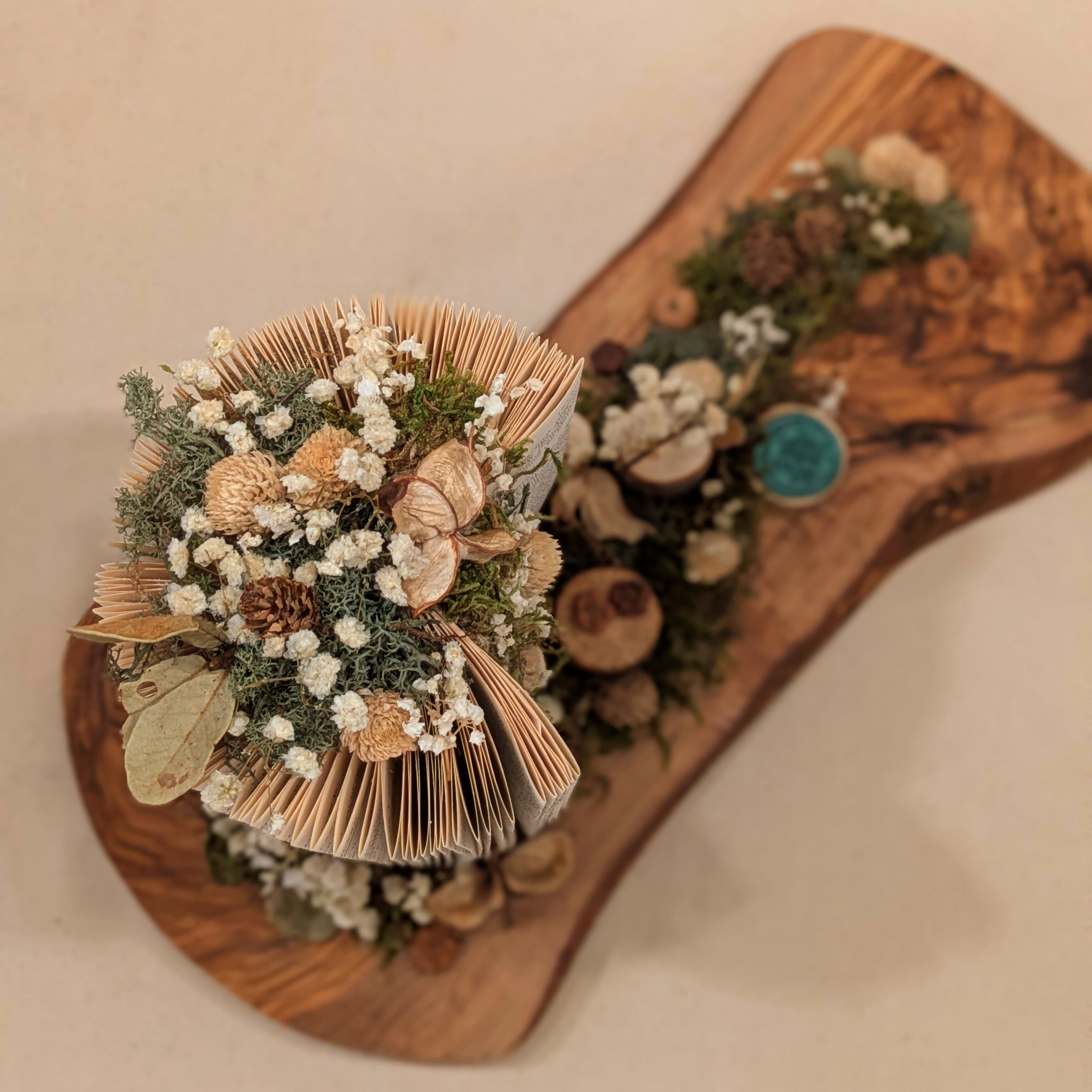 Warm Floral Arrangement on Wooden Slab
