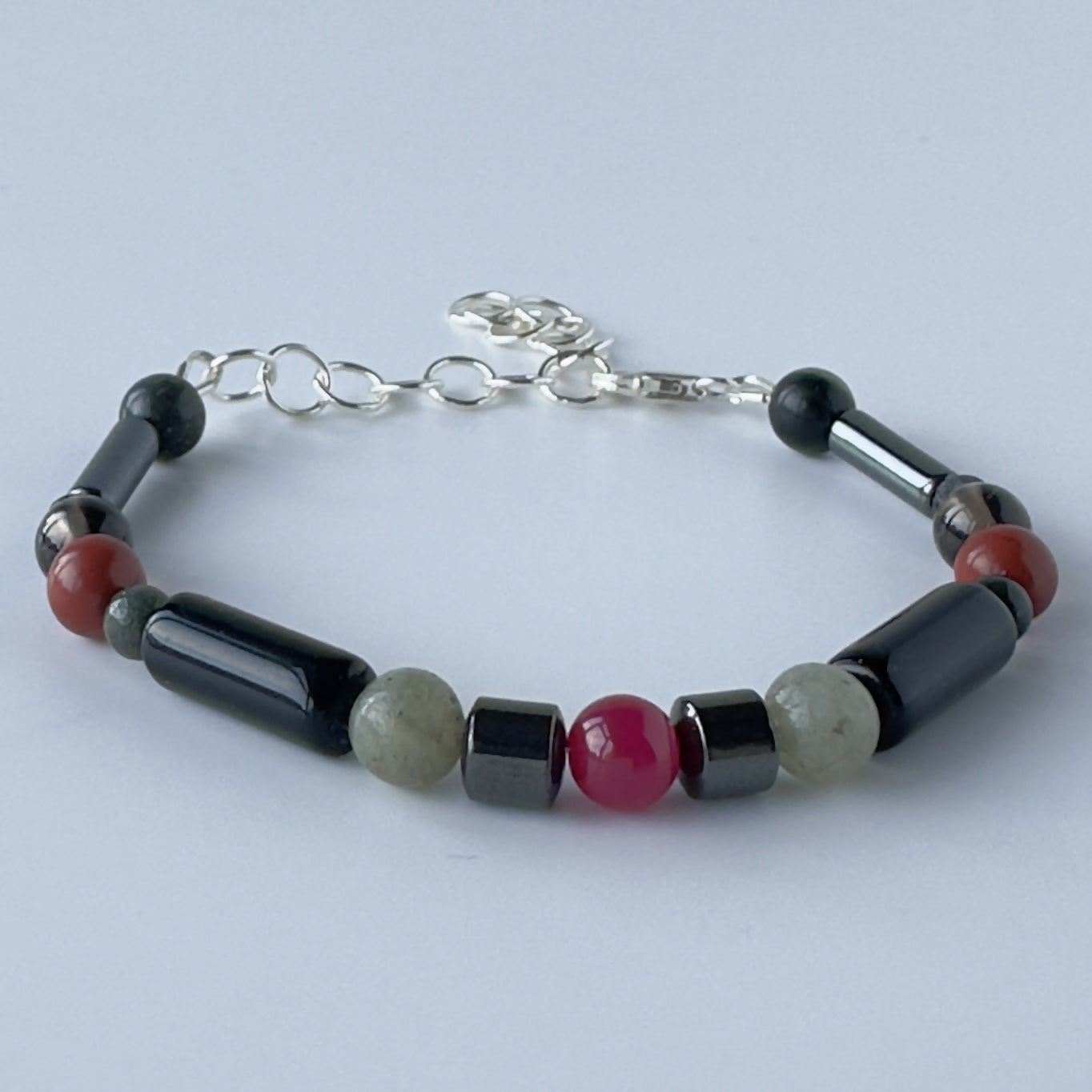 UNISEX HEALING CRYSTAL & STERLING SILVER ROOT CHAKRA BRACELET WITH AROMATHERAPY BEADS