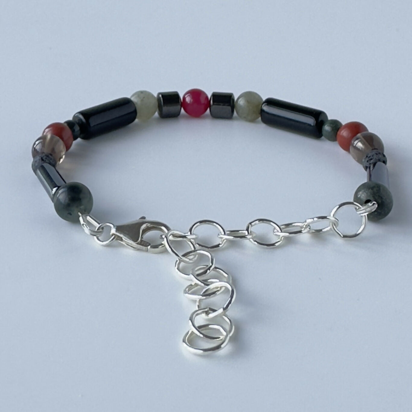 UNISEX HEALING CRYSTAL & STERLING SILVER ROOT CHAKRA BRACELET WITH AROMATHERAPY BEADS