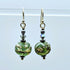HAND LAMPWORKED GLASS EARRINGS, WITH AN ETCHED FINISH,STERLING SILVER EAR WIRES AND SWAROVSKI CRYSTALS.