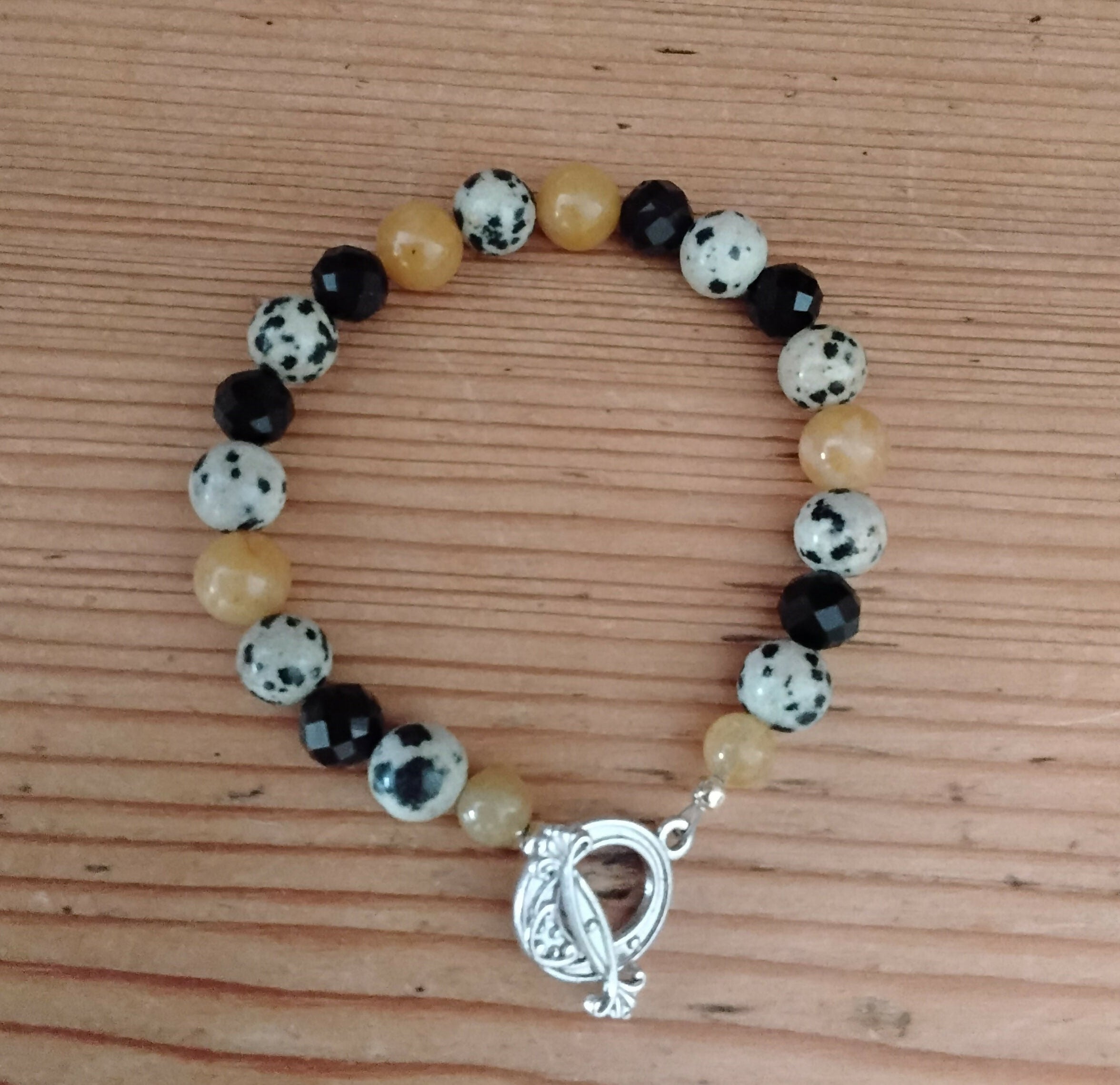Tibetan Silver Toggle Catch Bracelet with Yellow Jade, Dalmatian Jasper and Faceted Onyx.