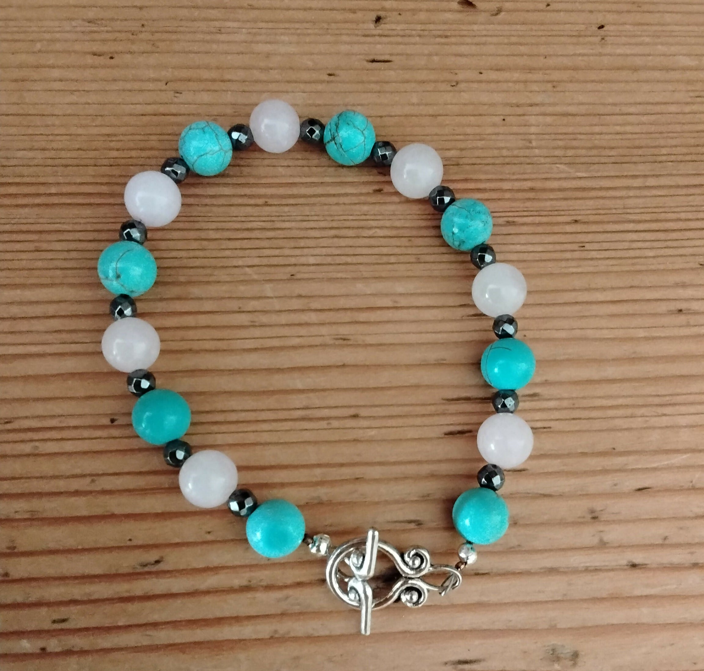 Tibetan Silver Toggle Catch Bracelet with Turquoise, Faceted Grey Hematite and Rose Quartz.