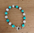 Tibetan Silver Toggle Catch Bracelet with Turquoise, Faceted Grey Hematite and Rose Quartz.