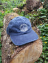 Blue cap with white mountain logo design.