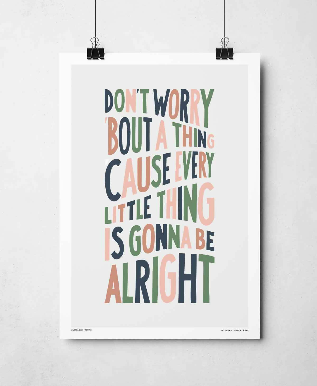 Pink, blue and green typography print of lyrics.