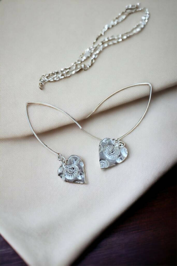 Embossed heart earrings