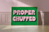 Pink and green typography print, 'PROPER CHUFFED'.
