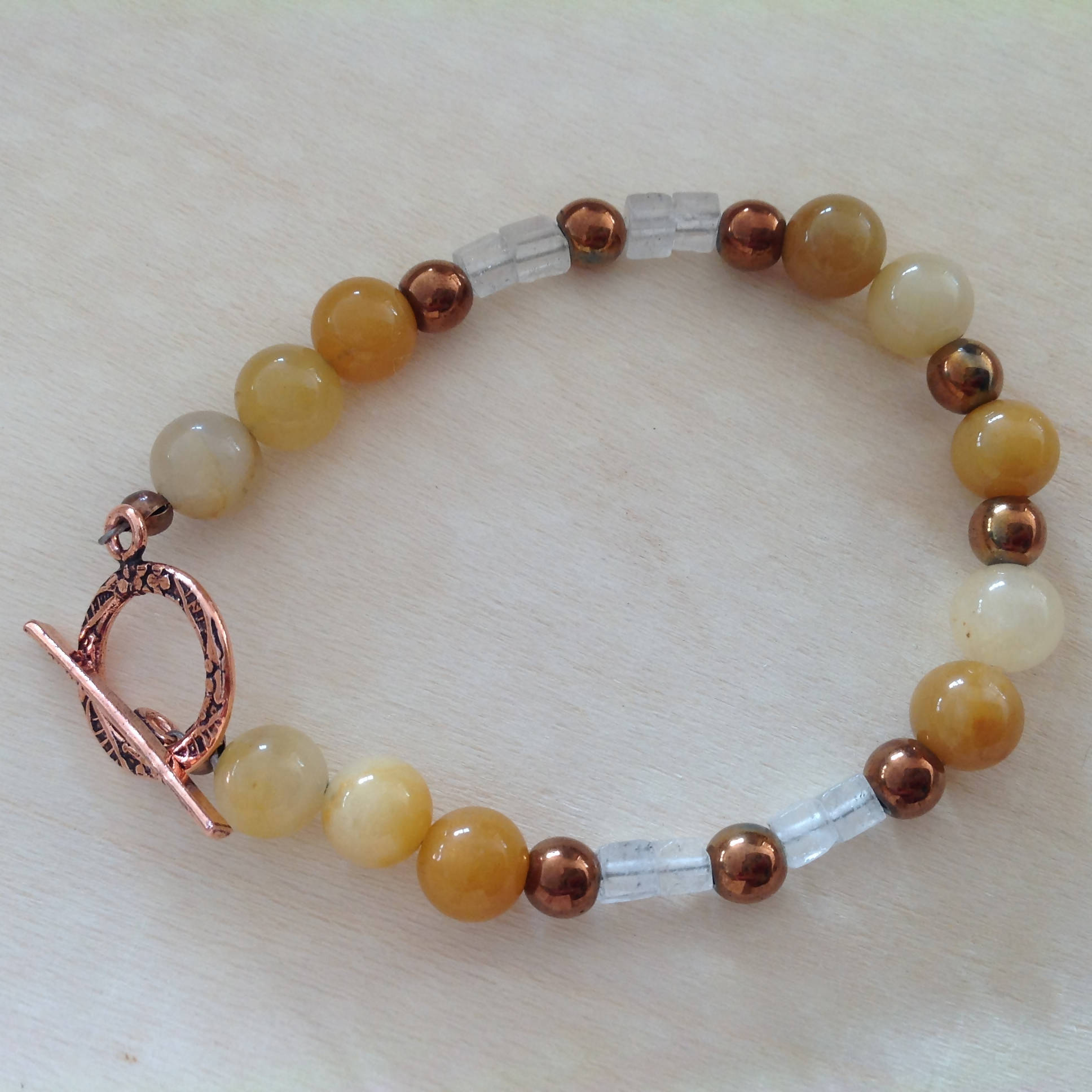 Bracelet with Yellow Jade, Copper Hematite and Clear Quartz, Pure Copper Toggle