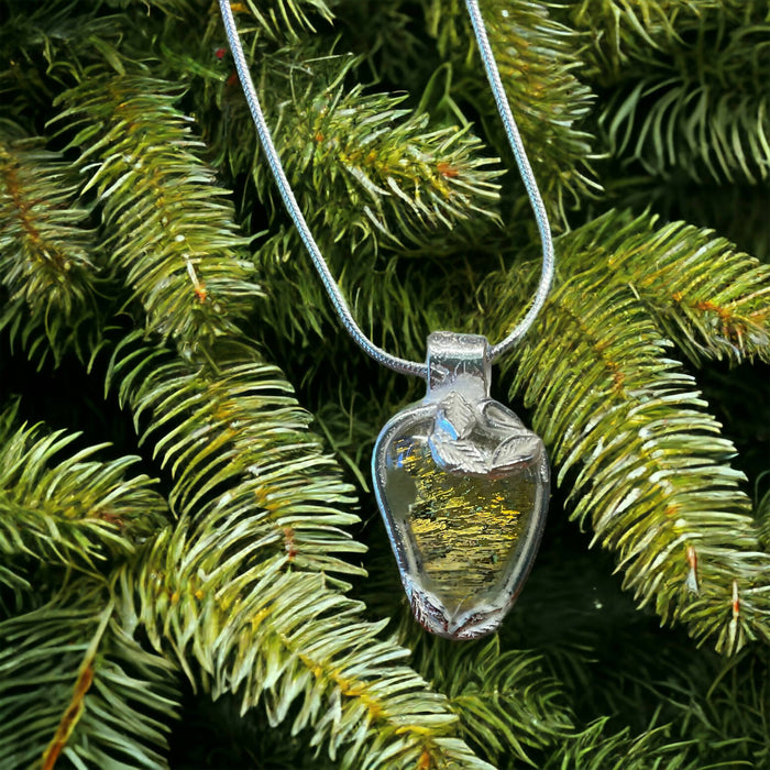 Silver and glass pendant