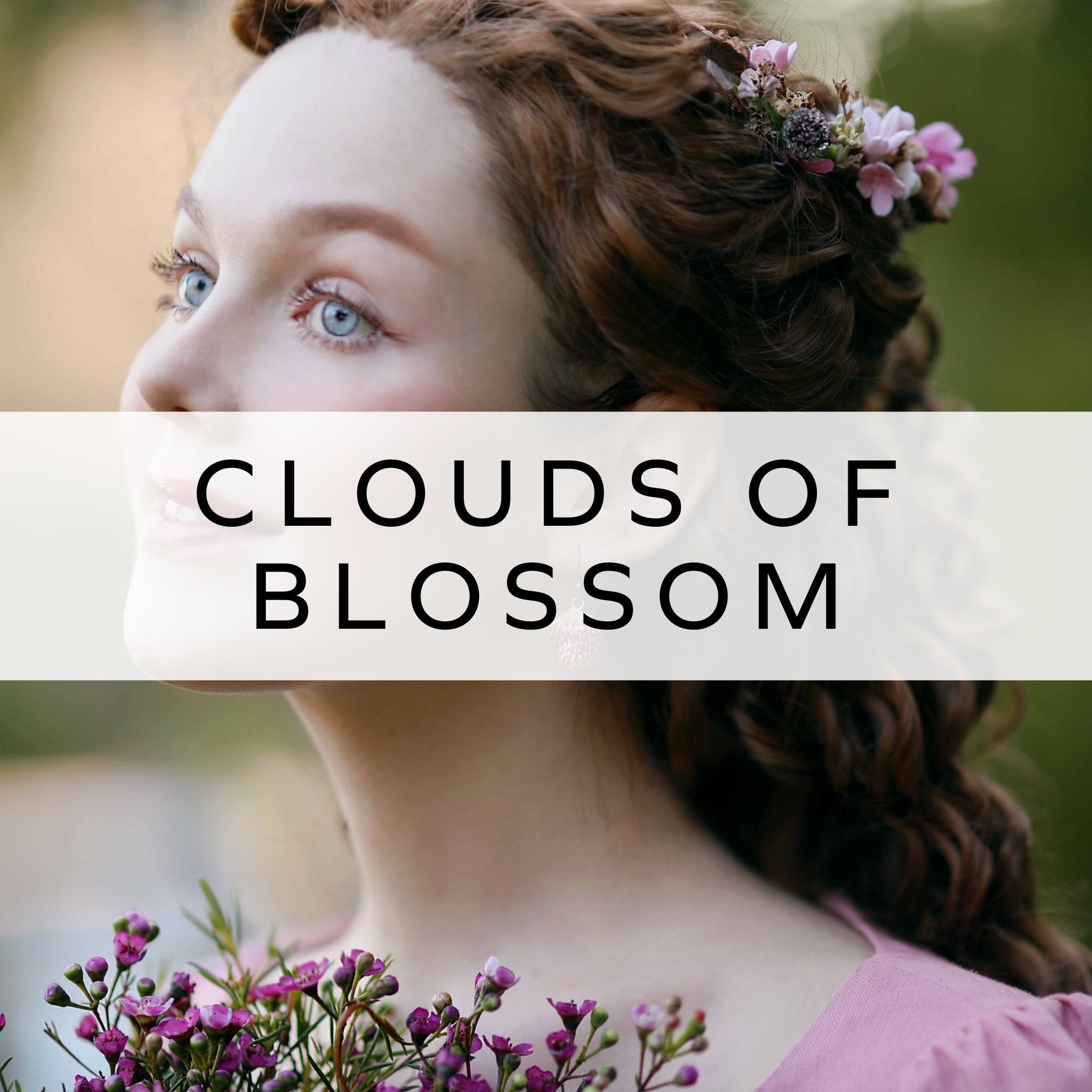 A girl with curly hair wears a delicate flower crown while gently clasping a vibrant floral bouquet, exuding natural beauty and elegance.