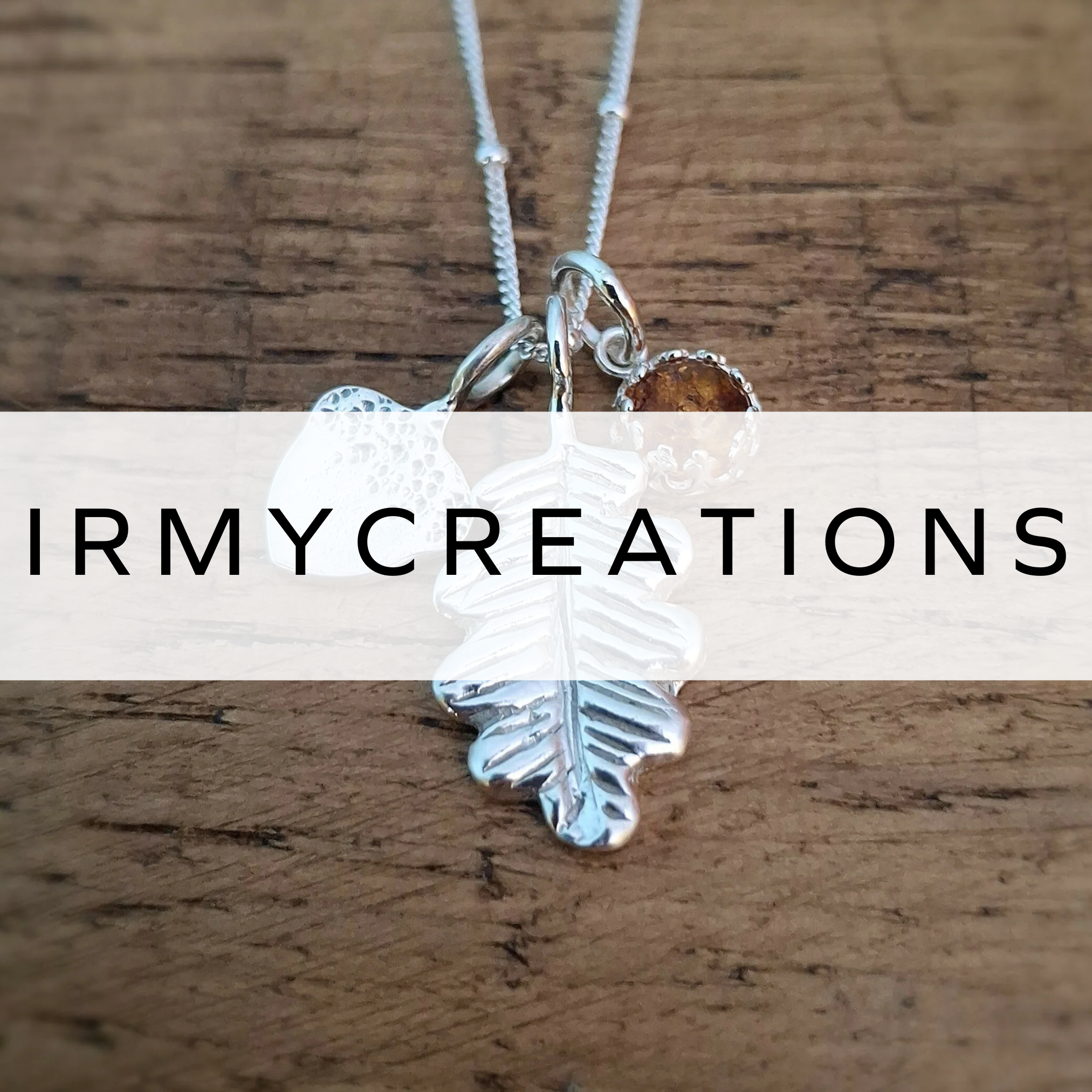 Silver leaf pendant and gemstone. 