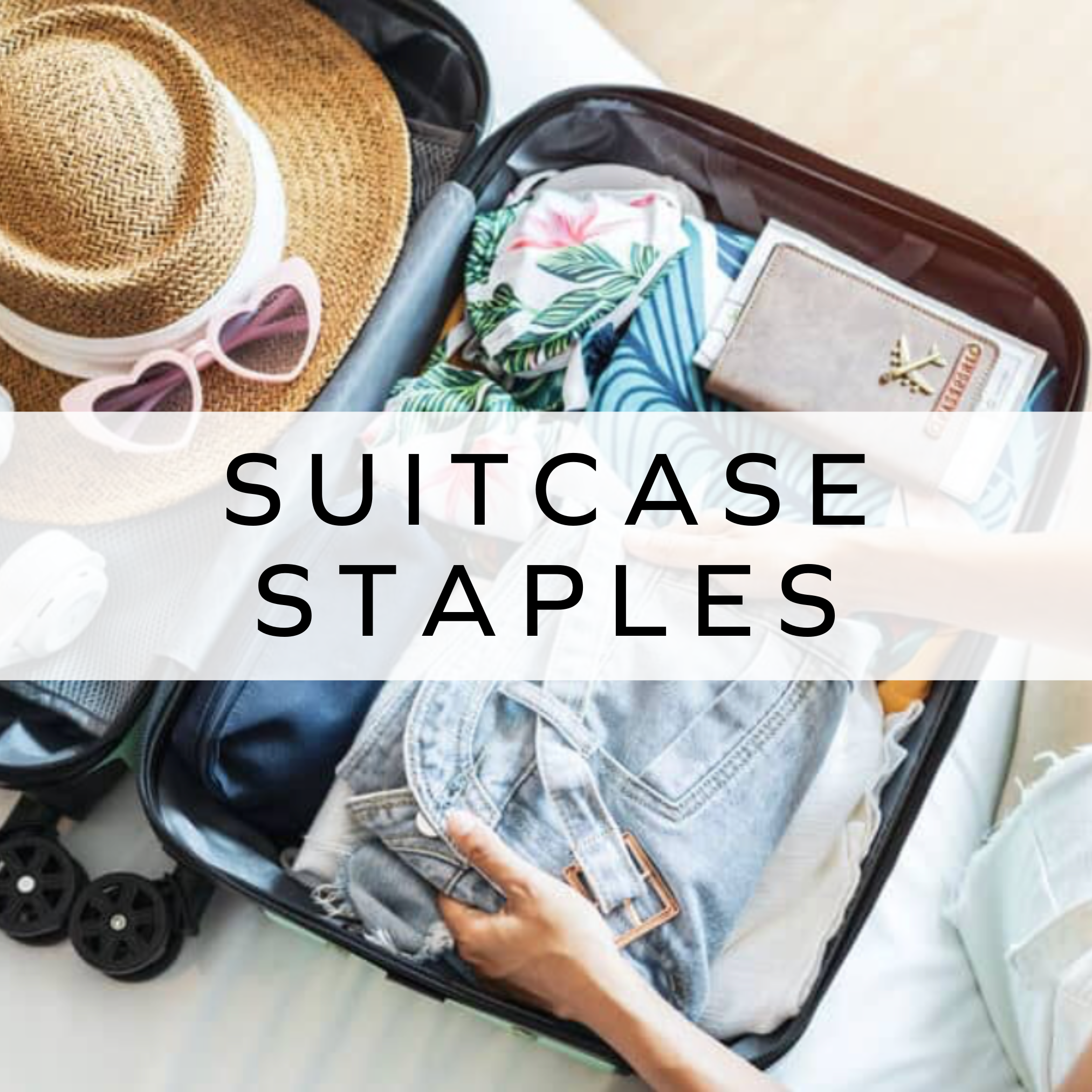 Image of suitcase filled with clothes and hats.