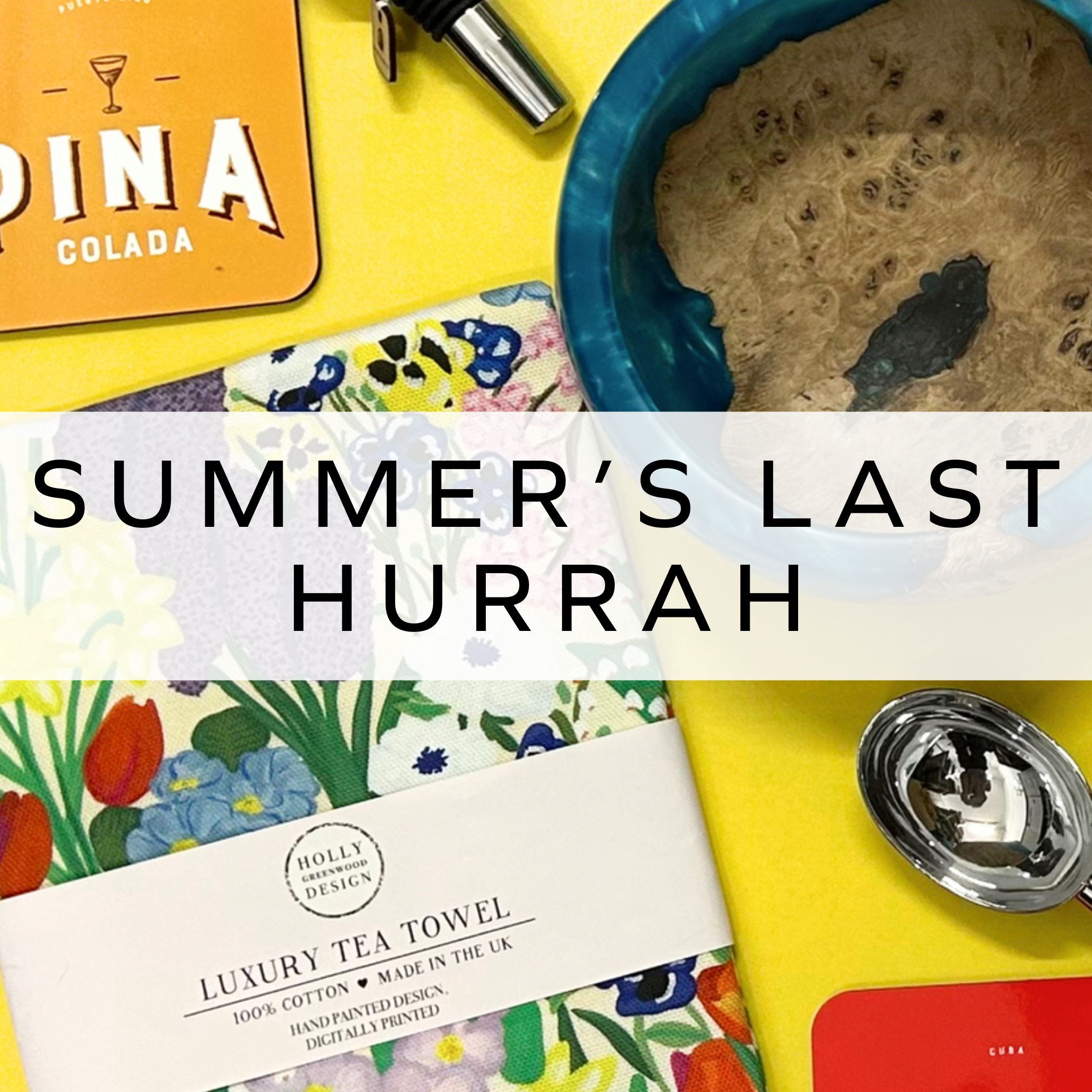 A bright selection of tea-towels, coasters and other homeware. 