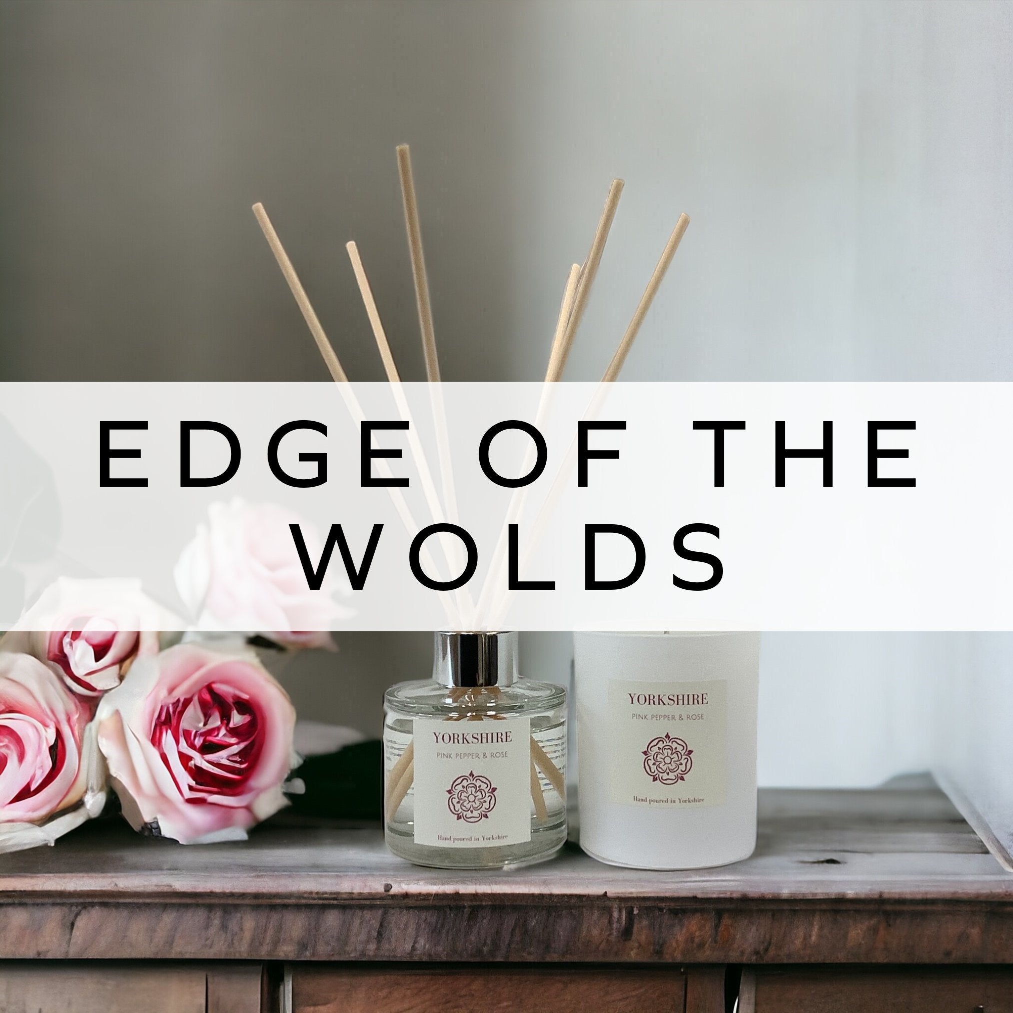 Hand-poured candle and reed diffuser with a pink Yorkshire rose on the label, elegantly designed to showcase Yorkshire-inspired luxury scents for a calming ambiance.