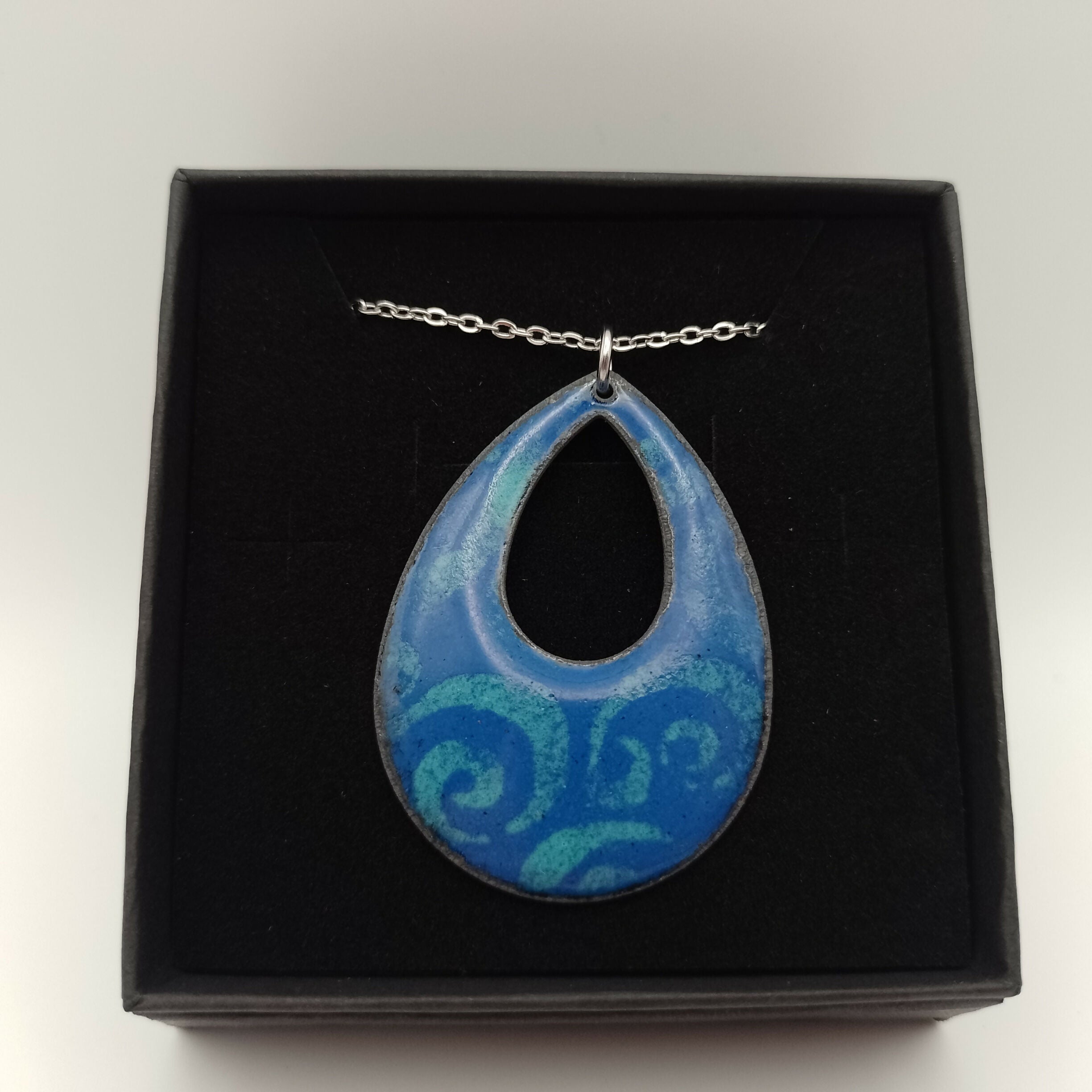 Dark Blue Enamel Pendant with Pale Blue Swirl Pattern