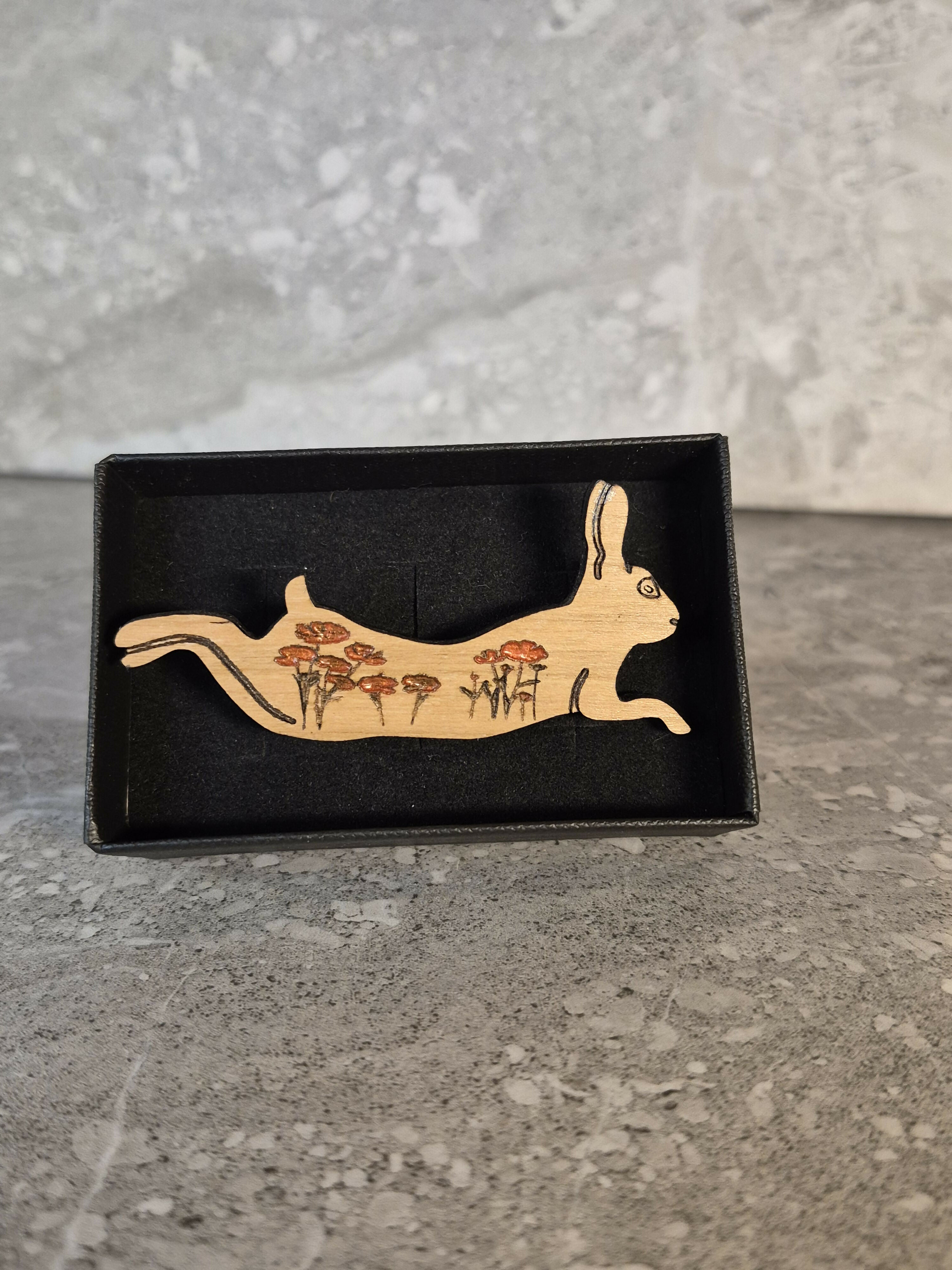 Handcrafted Cherry Veneered Leaping Hare Pin with Flower Decoration