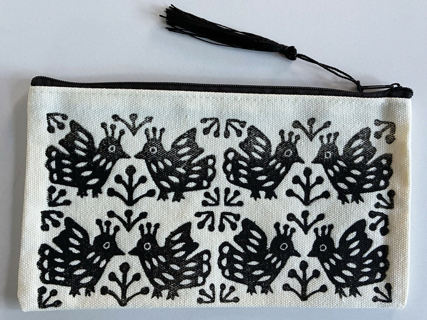Hand-printed Zip Pouch with Black-Crested Bird Design.