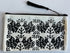 Hand-printed Zip Pouch with Black-Crested Bird Design.