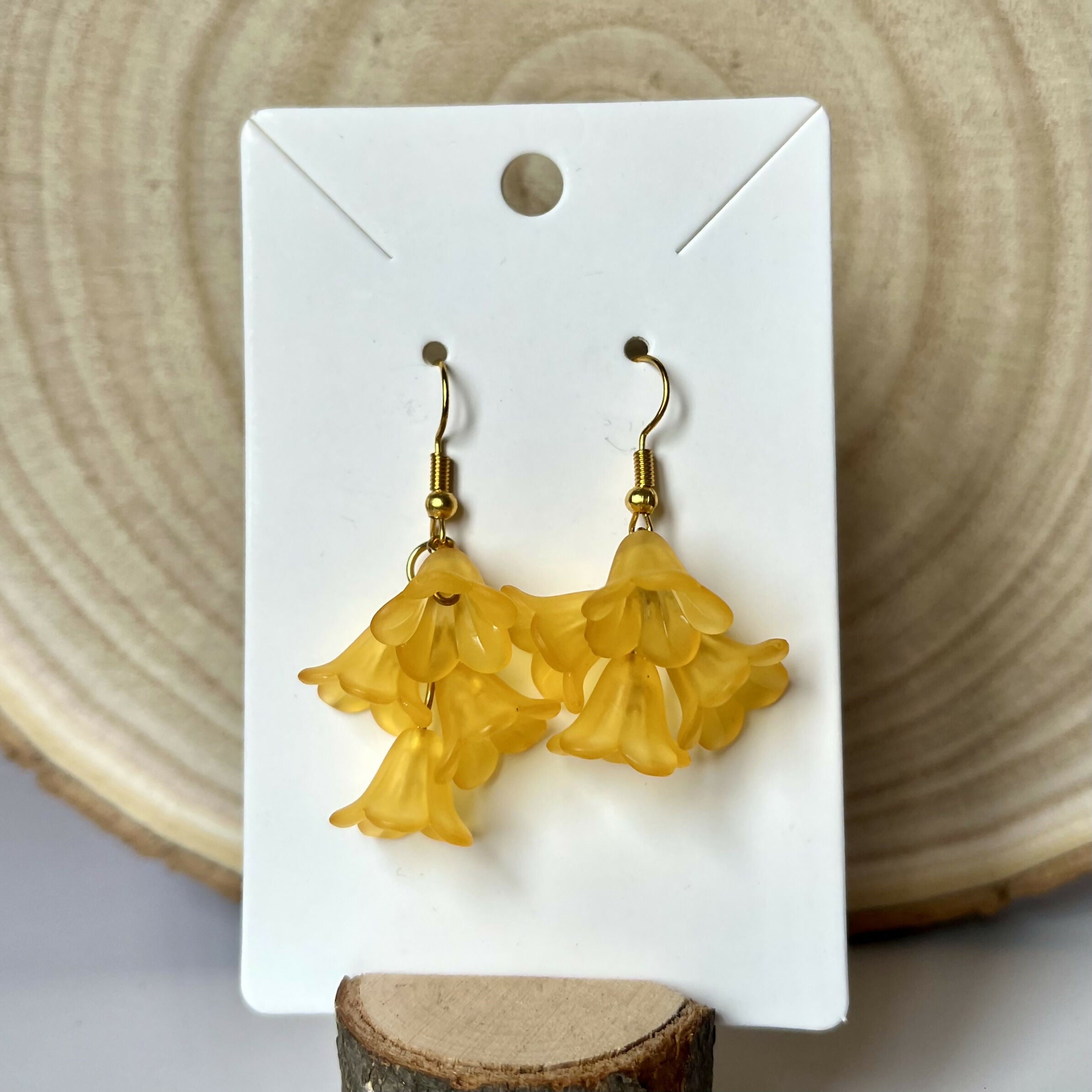 Cascading Orange Flower Earrings In Gold