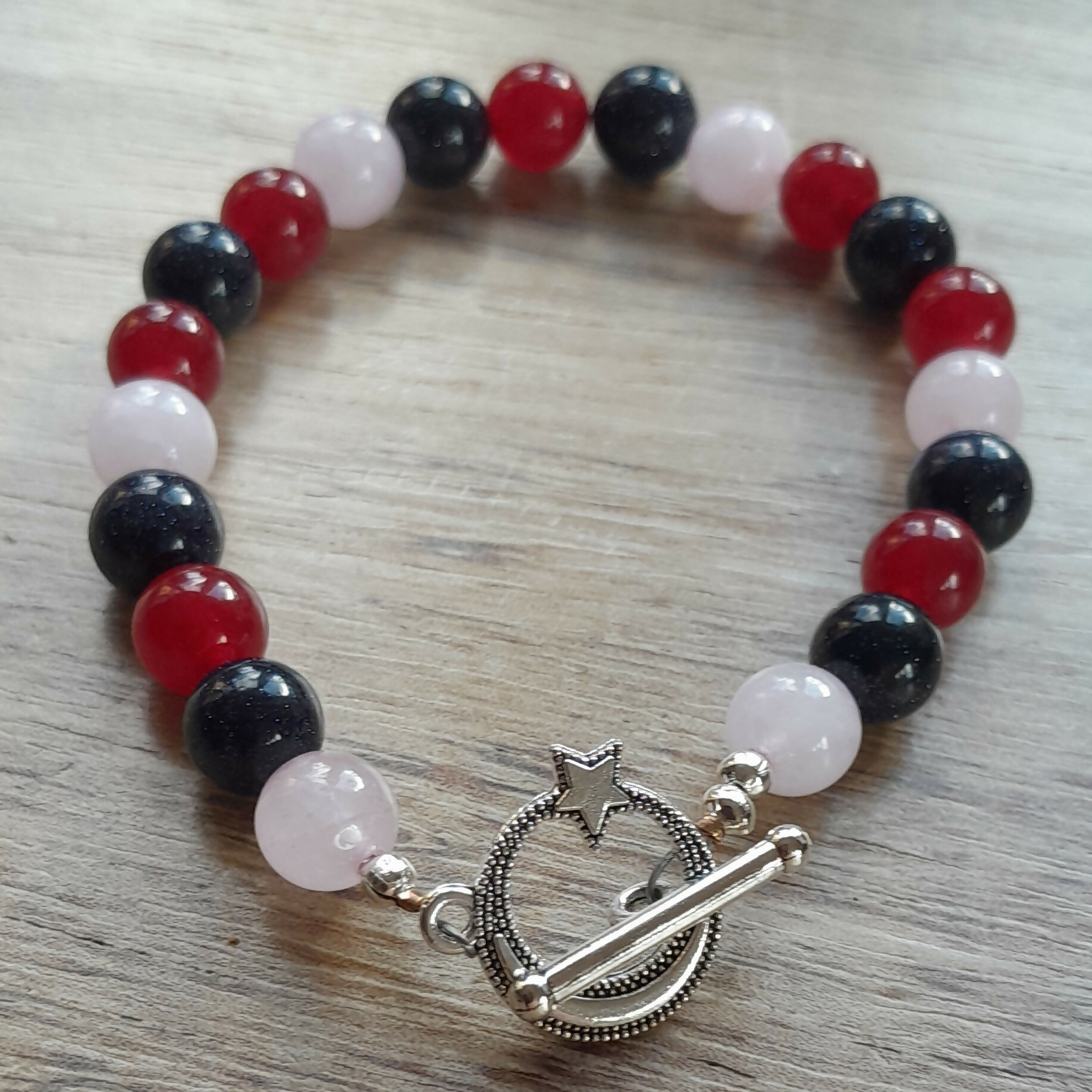Tibetan Silver Toggle Clasp Bracelet with Rose Quartz, Navy Goldstone and Red Chalcedony.