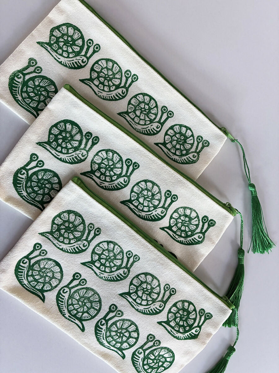 Hand Printed Zip Pouch with Green Snail Design.